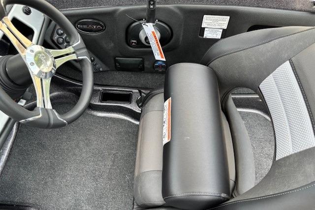 Interior of a 2026 Ranger 212LS boat featuring steering wheel and seating.