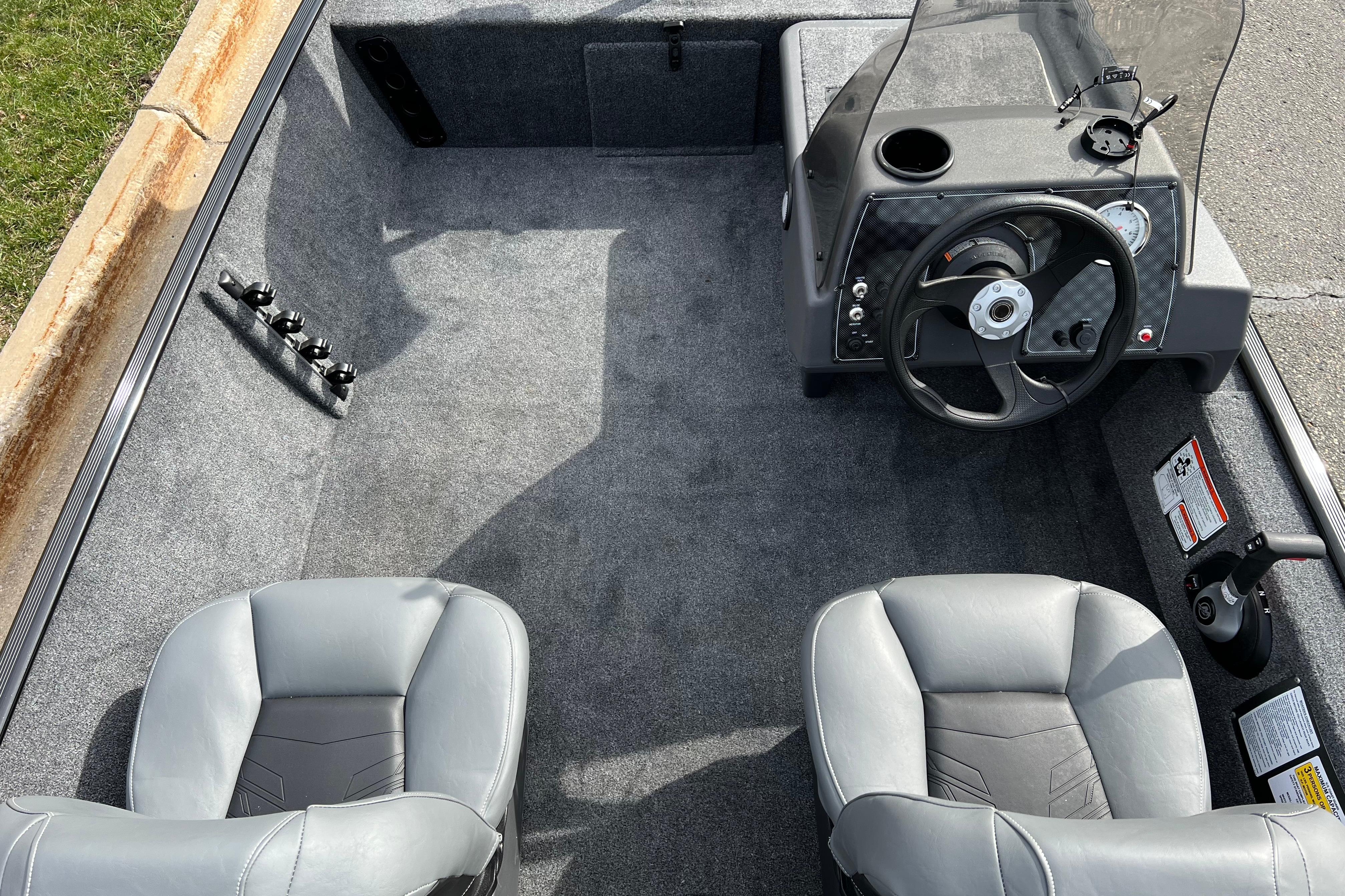 2026 Tracker Bass Tracker Classic XL boat interior with steering console and seating.