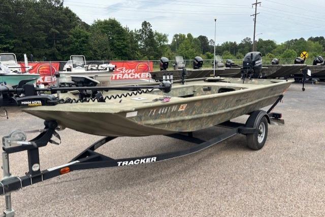 2017 Tracker Grizzly 1654 MVX Sportsman boat on trailer, displayed outdoors.