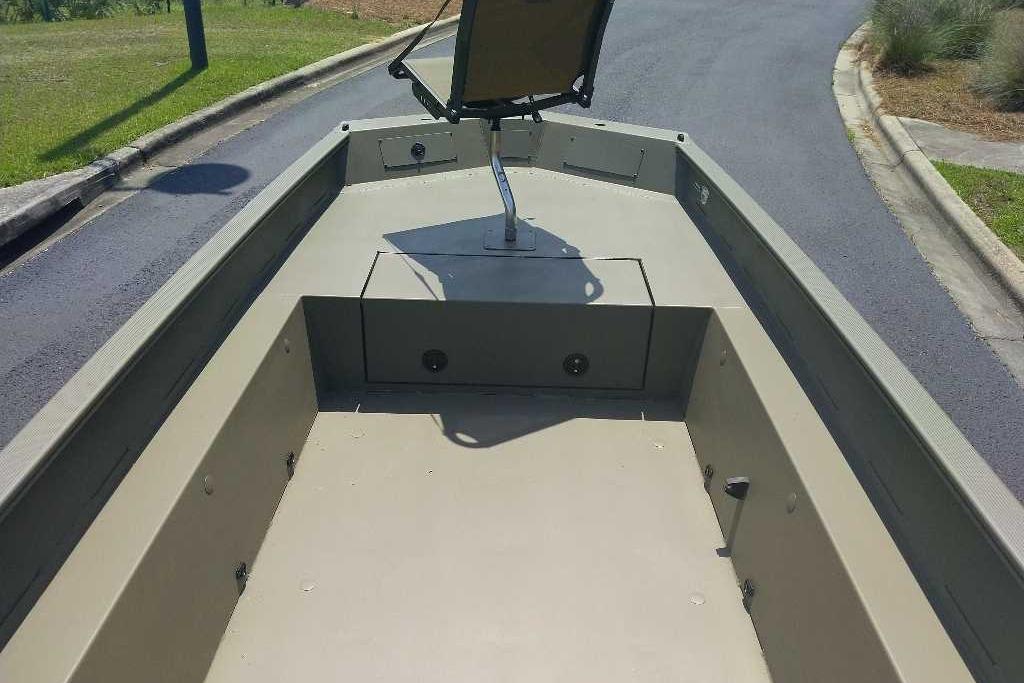 2026 Tracker Grizzly 1650 T Prairie Wings Edition boat interior, featuring a spacious deck.