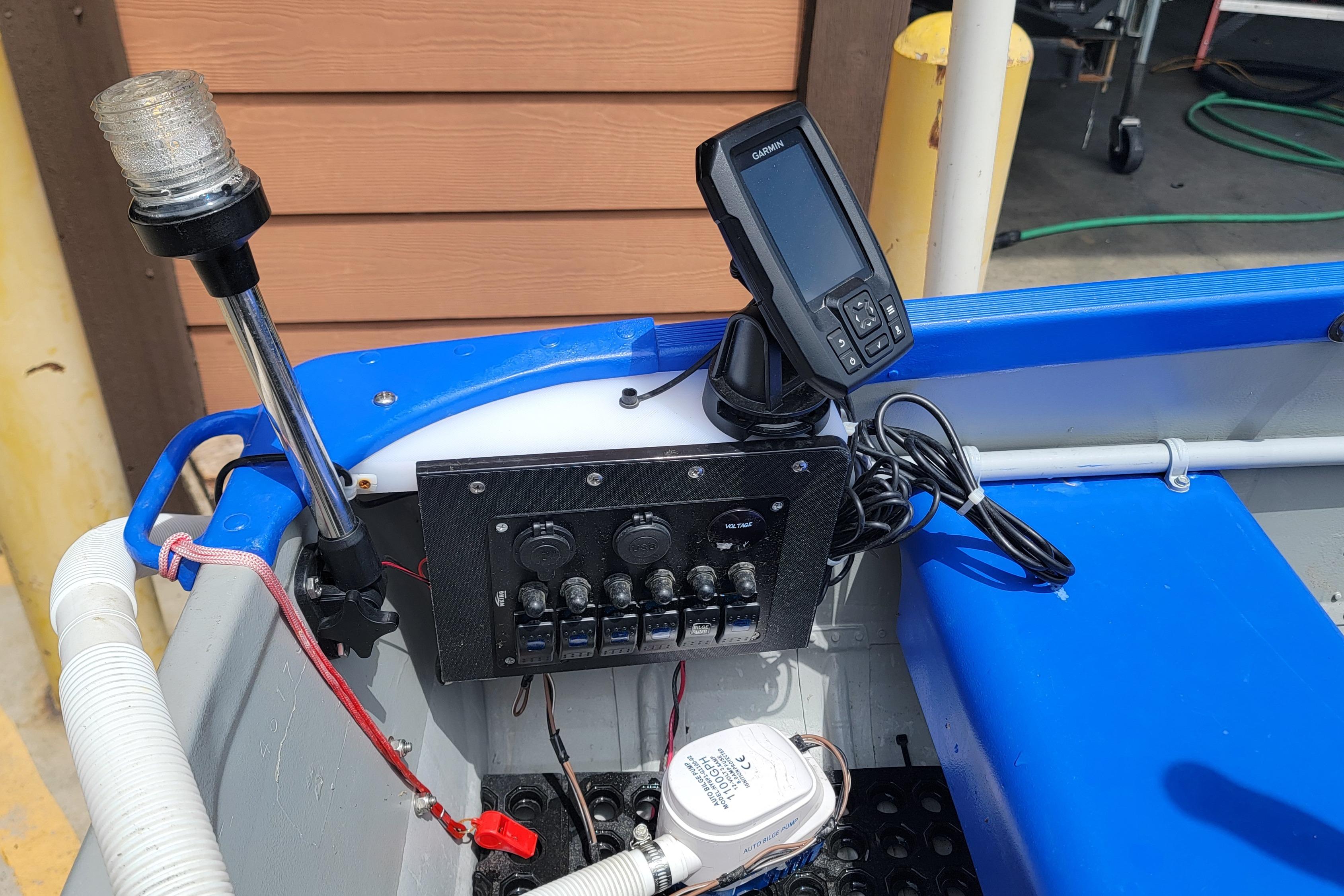 1966 Sea Nymph V-14 boat dashboard with navigation equipment and control panel.
