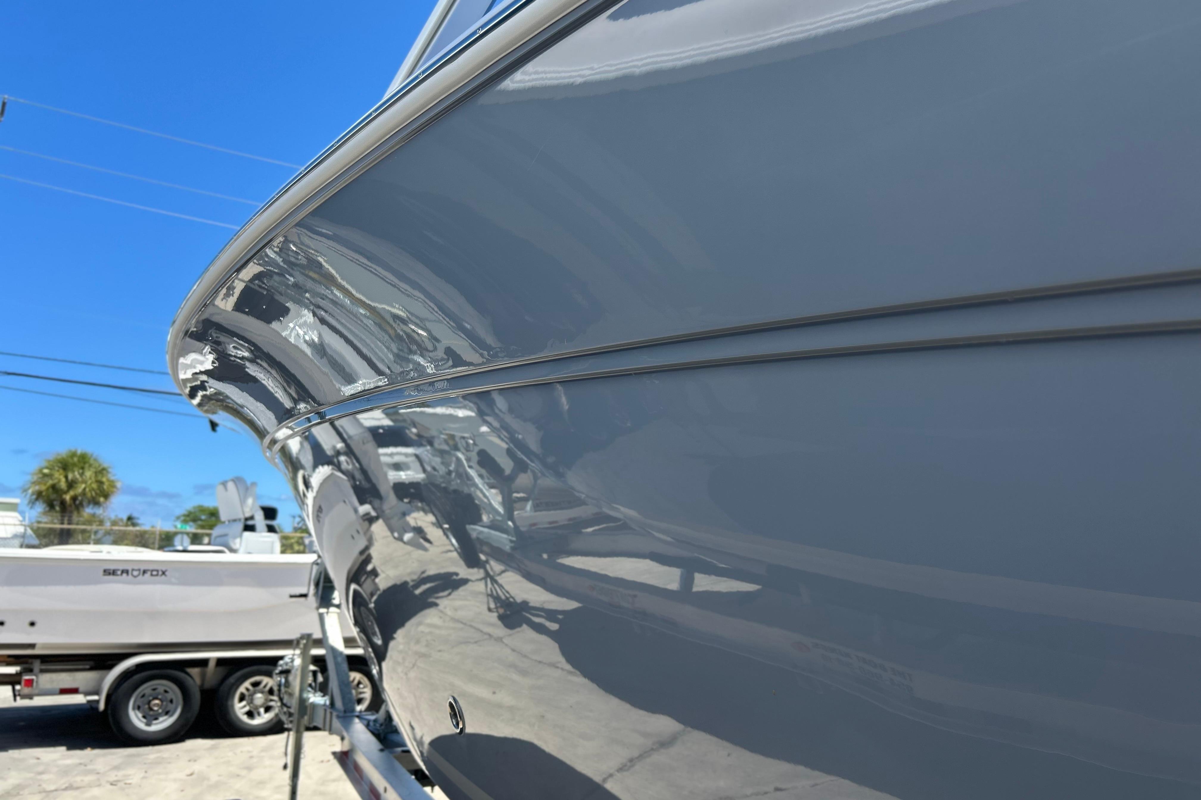 2026 Sea Fox 288 Traveler boat with sleek hull design under clear blue sky.