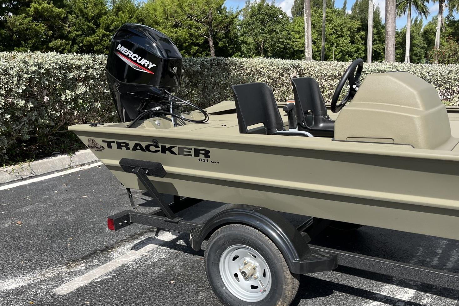 2026 Tracker Grizzly 1754 SC boat with Mercury engine on trailer.
