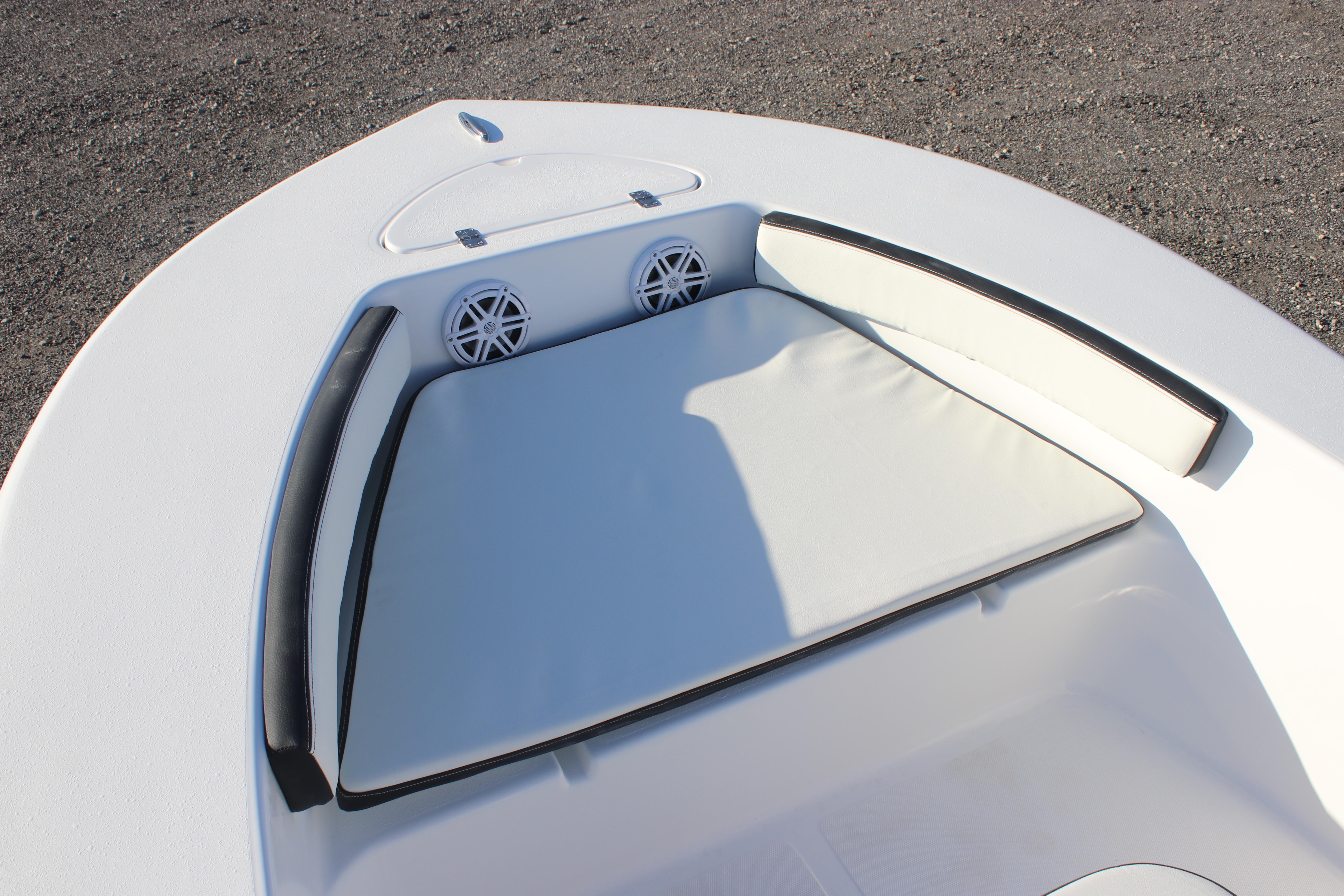 2026 Tidewater 180 CC Adventure boat bow with cushioned seating and speakers.