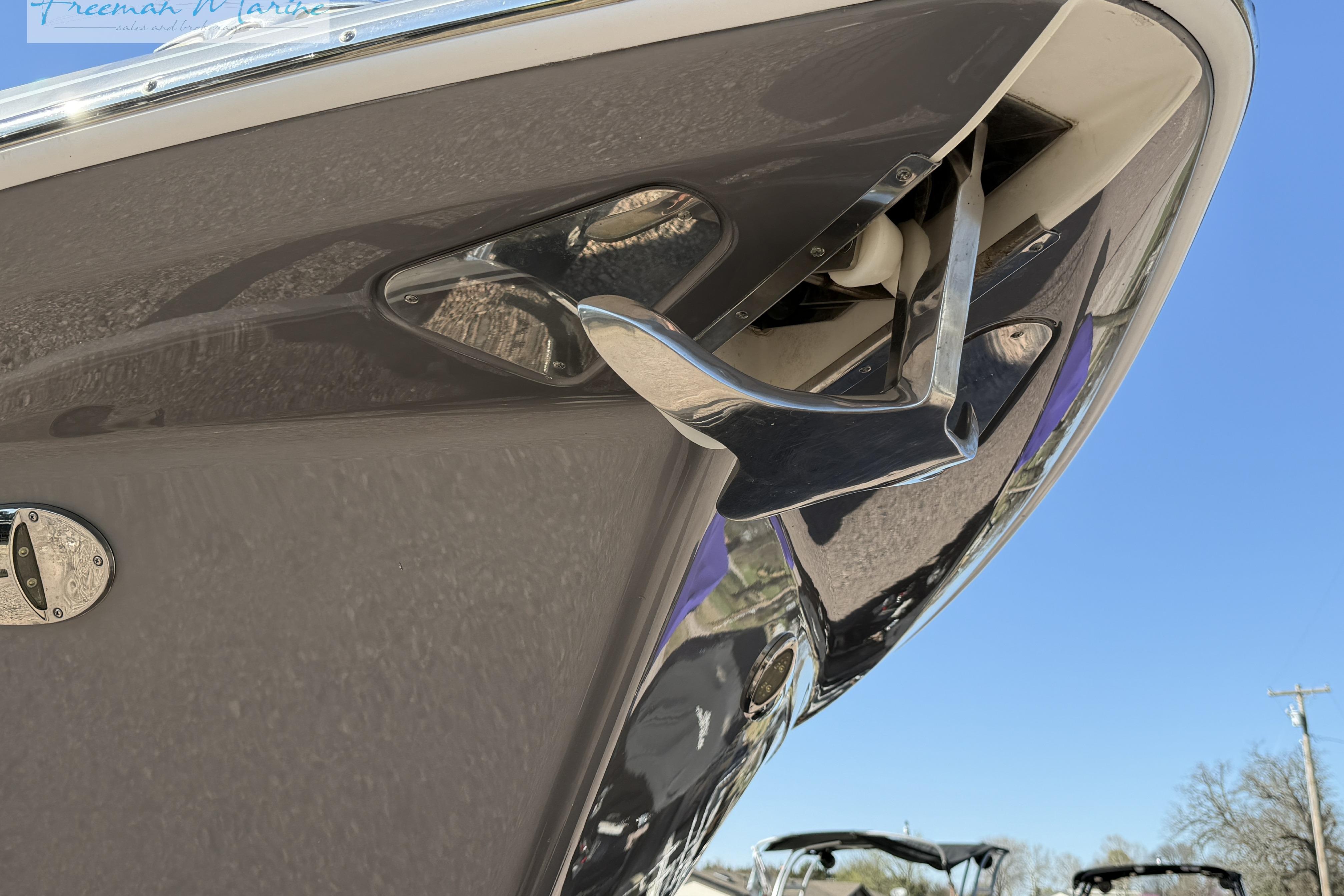 2018 Formula 34 Performance Cruiser bow with anchor detail against clear sky.