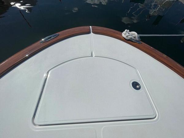 2025 Mag Bay 43 Center Console boat bow with anchor hatch.