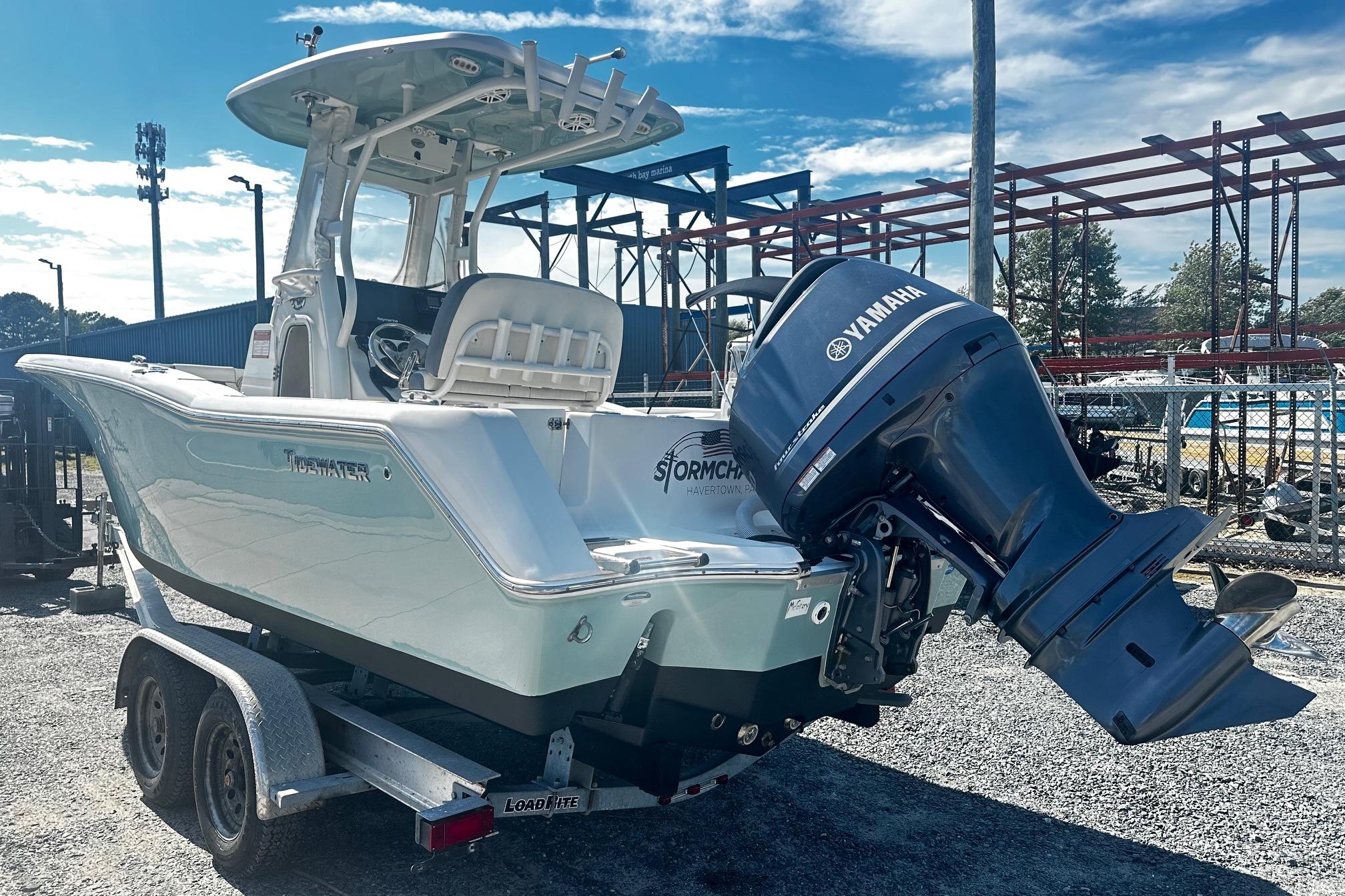 2020 Tidewater 230 CC Adventure boat with Yamaha engine on trailer.