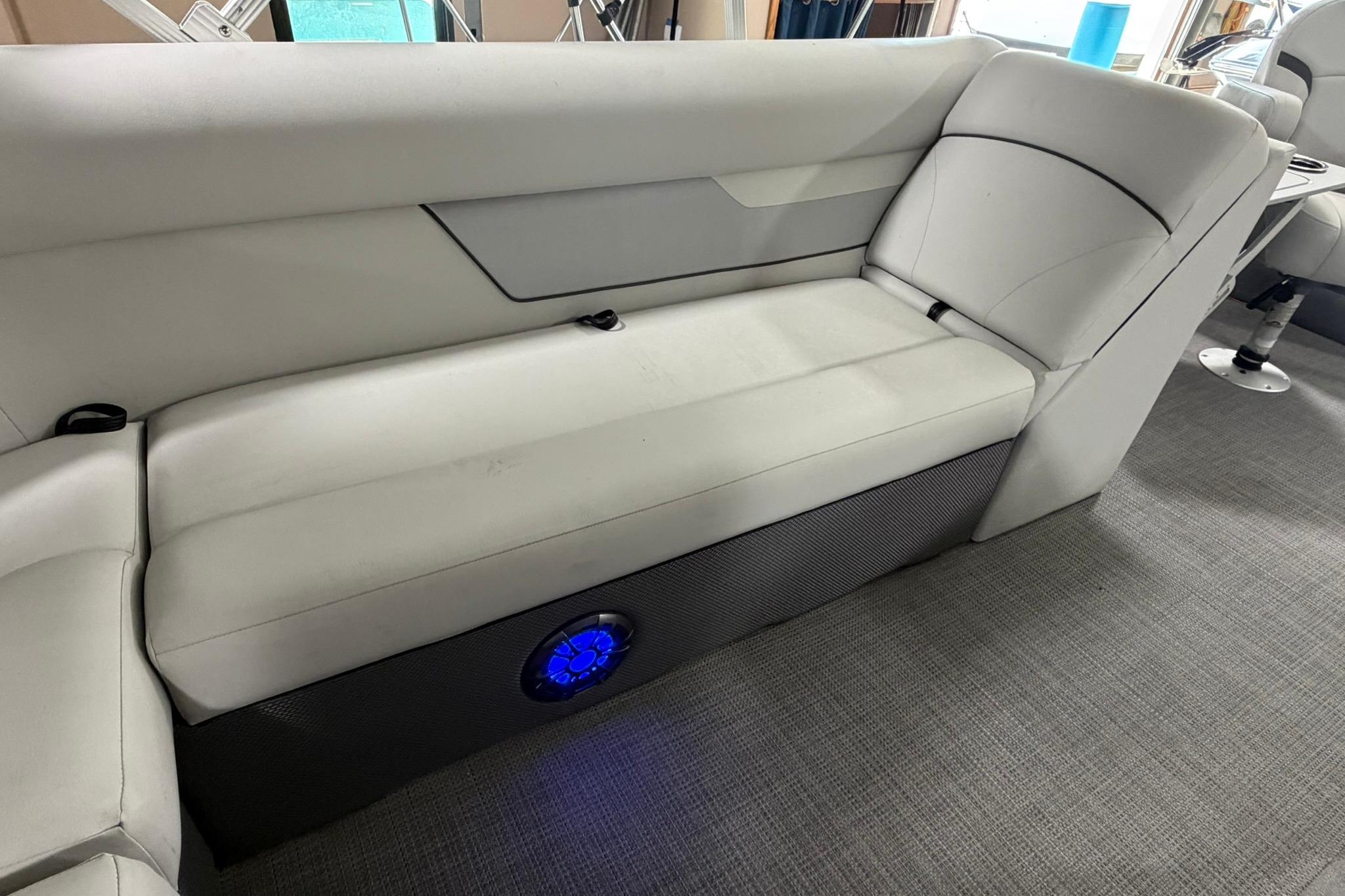 2023 Crest Classic LX 200 boat interior with plush seating and illuminated speaker.