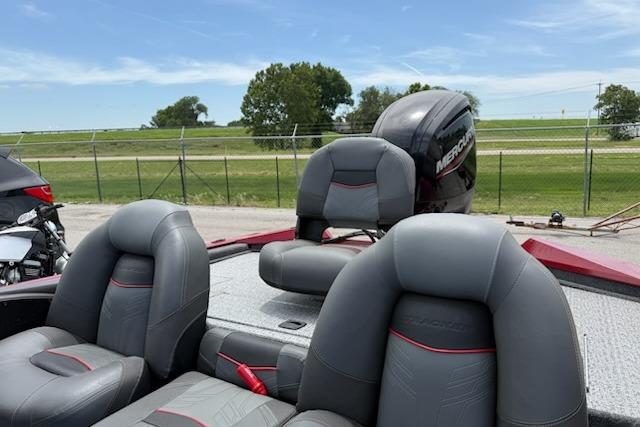 2024 Tracker Pro Team 175 TXW boat with Mercury engine, featuring comfortable seating.
