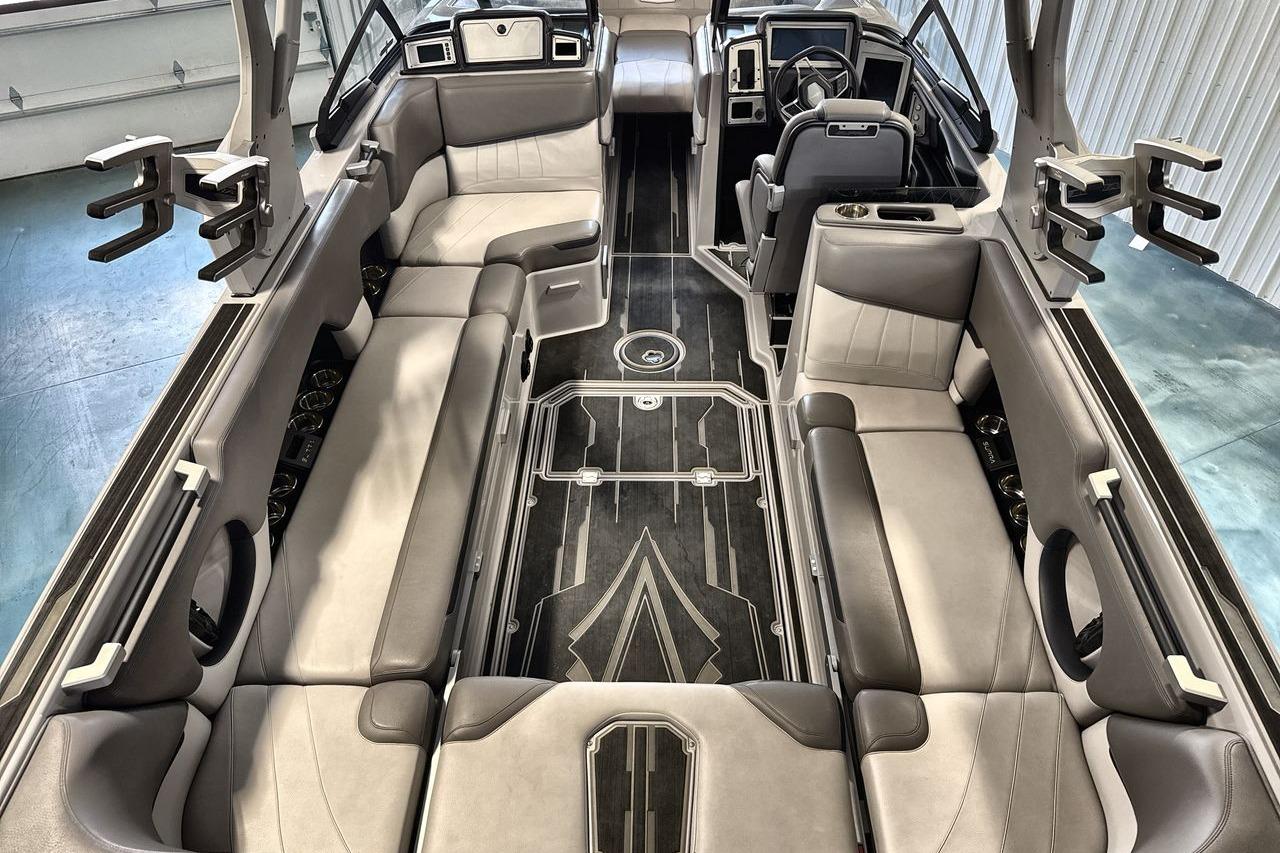 2021 Supra SE 550 boat interior with luxurious seating and modern dashboard design.