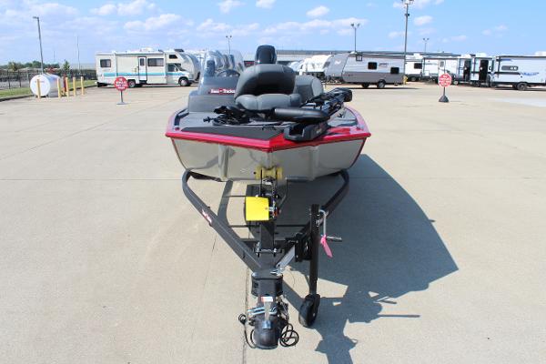 2025 Tracker Bass Tracker Classic XL boat on trailer in parking lot.