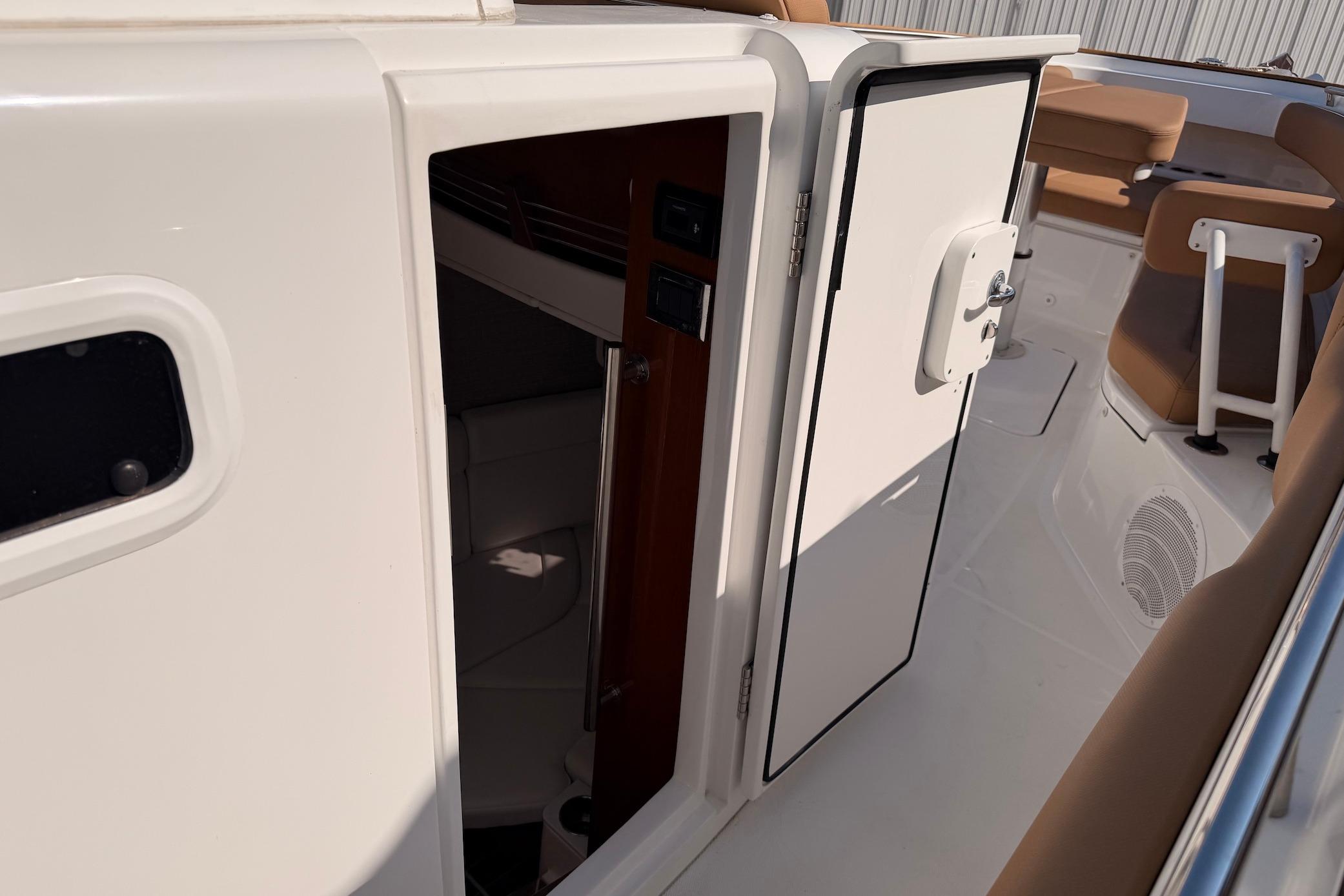 2022 HCB 42 Lujo boat interior entrance with open cabin door.