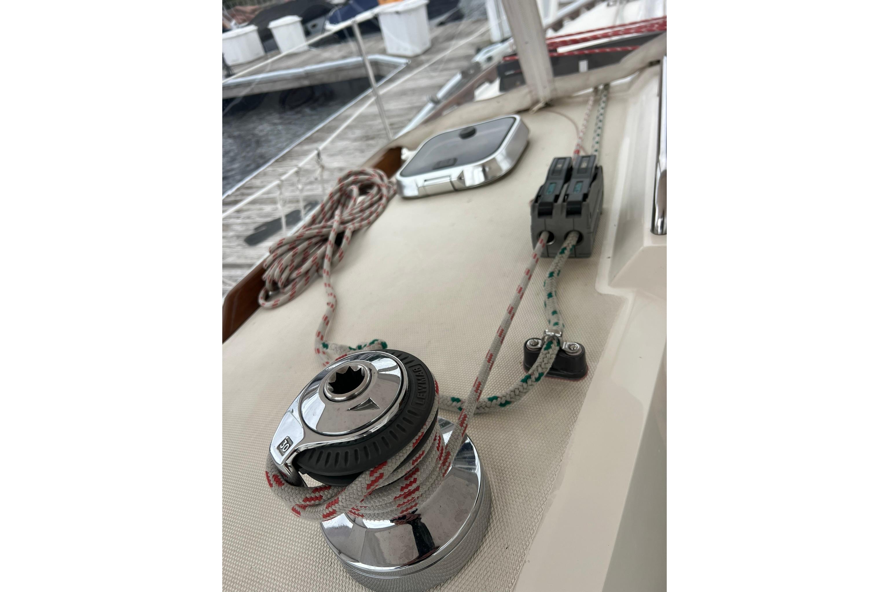 Deck of 1998 Sabre 362 sailboat with winch and ropes.