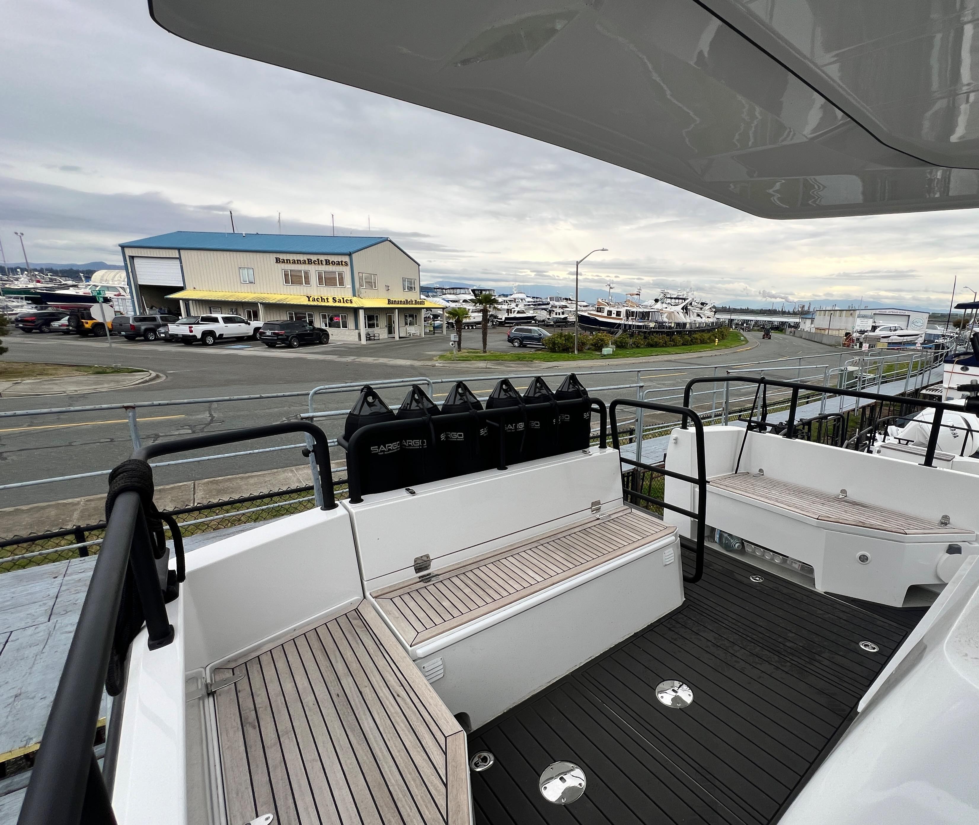 2024 Sargo 36 Explorer yacht deck with marina view.
