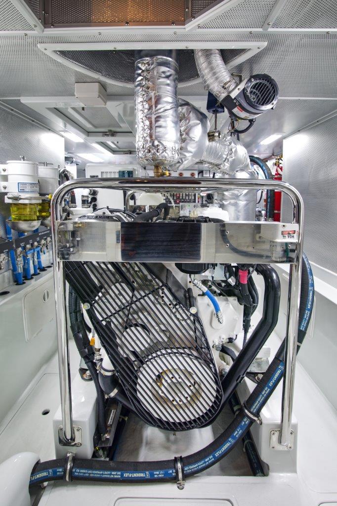 Engine room of 2024 Nordhavn 475 yacht with advanced machinery and piping.