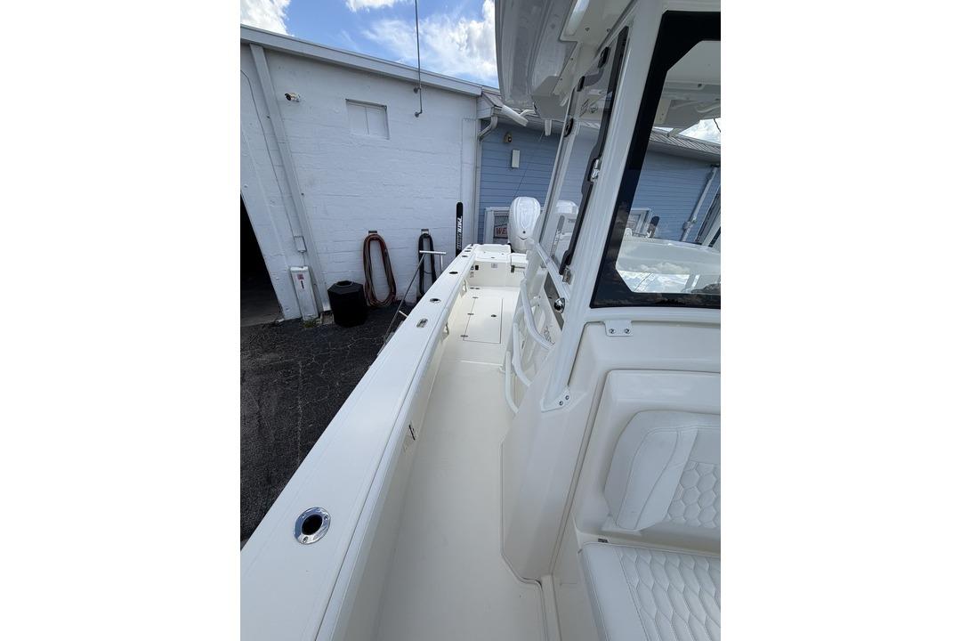 2026 Pathfinder 2800 Hybrid boat interior, showcasing sleek white seating and modern design.