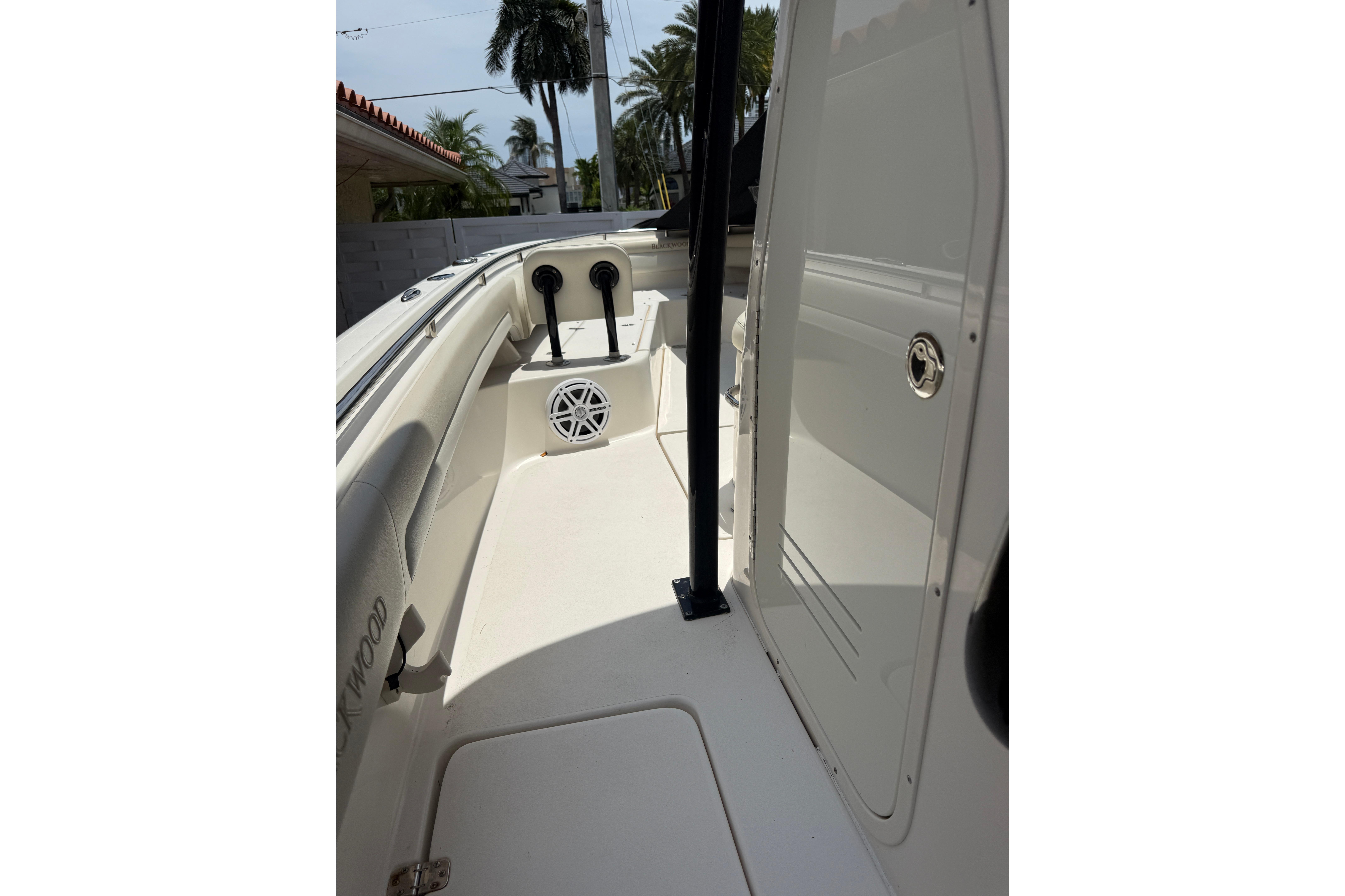 2015 Blackwood 27 boat interior with speaker and storage compartment.