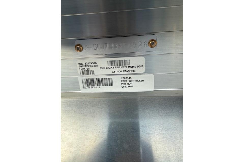 2026 Sun Tracker Fishin' Barge 22 XP3 identification plate with serial numbers and labels.