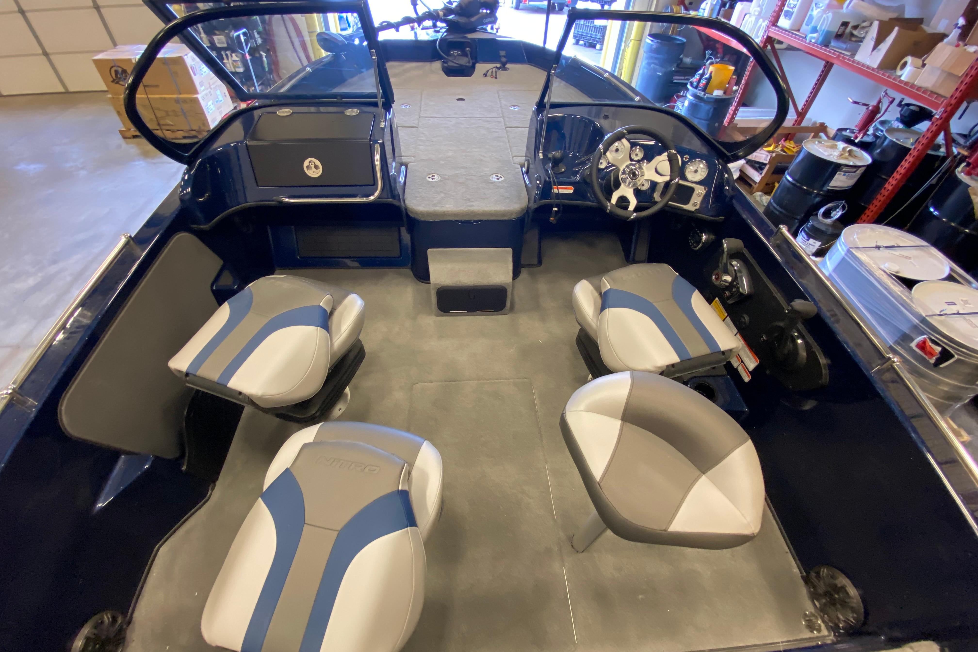 Interior of 2026 Nitro ZV19 Pro boat with modern seating and steering console.