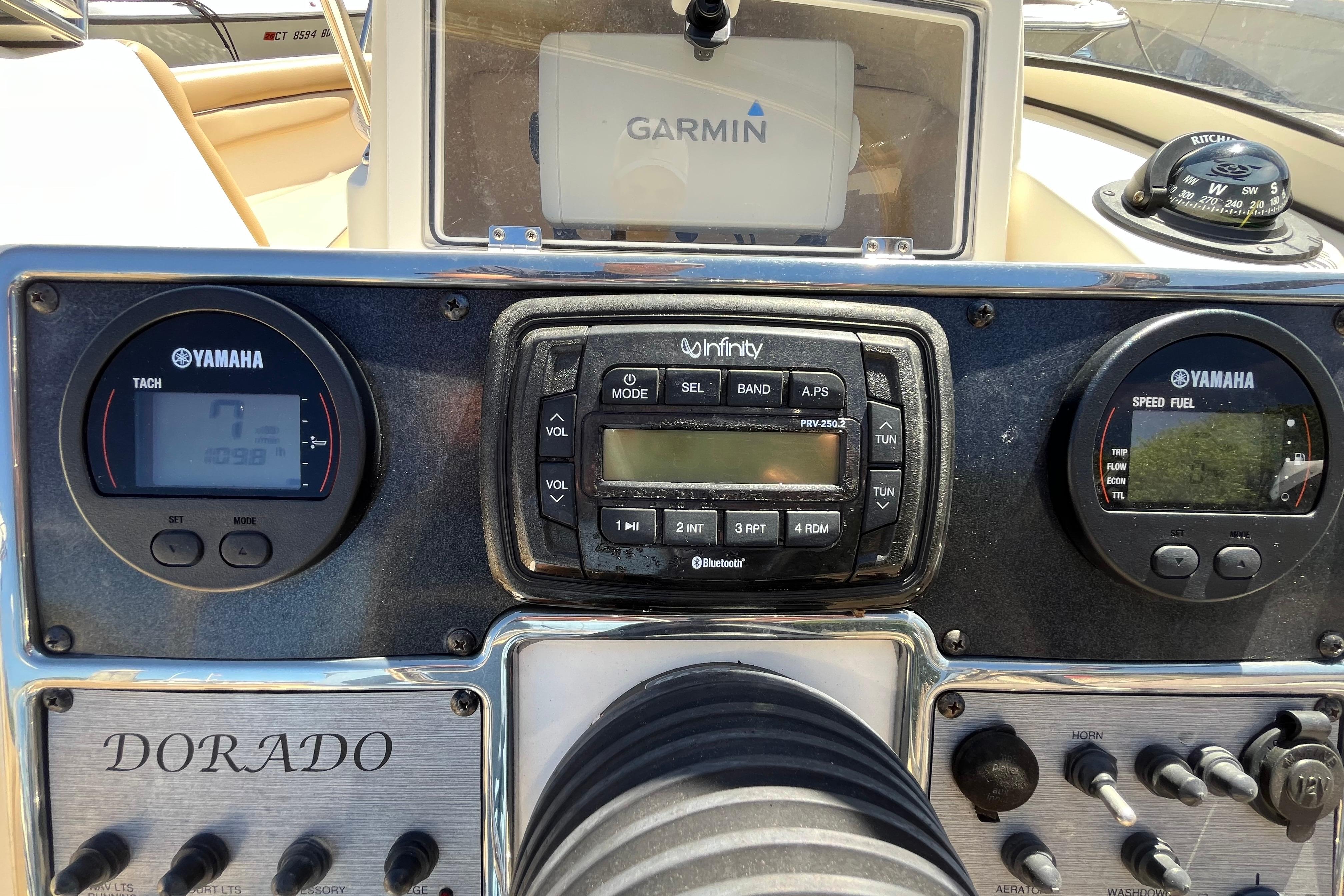 Dashboard of a 2017 Scout 210 Dorado boat with Yamaha gauges and Garmin GPS.