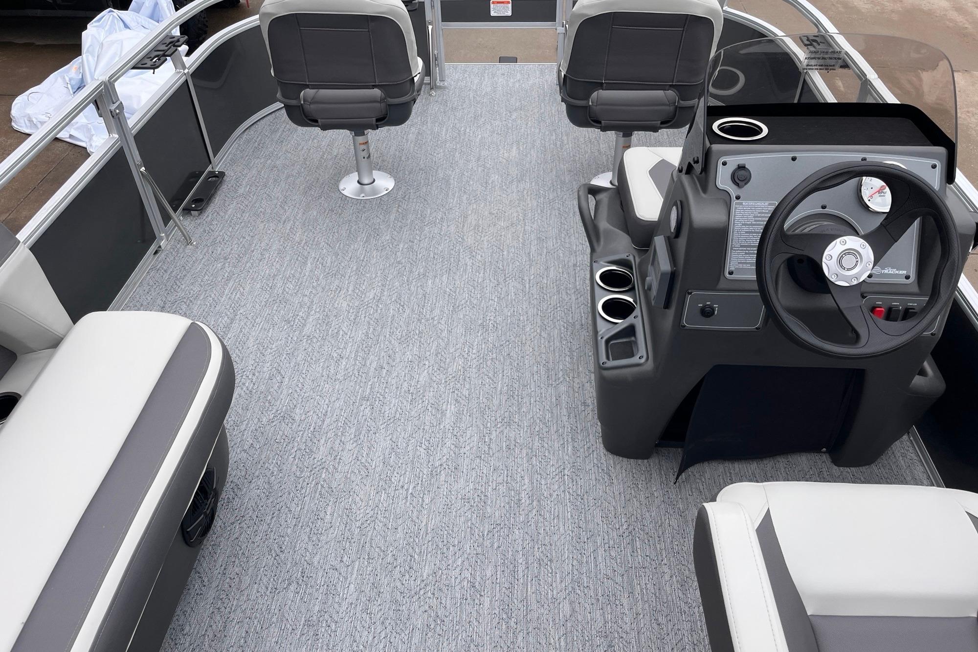 2026 Sun Tracker Bass Buggy 16 XL Select interior with seating and steering console.