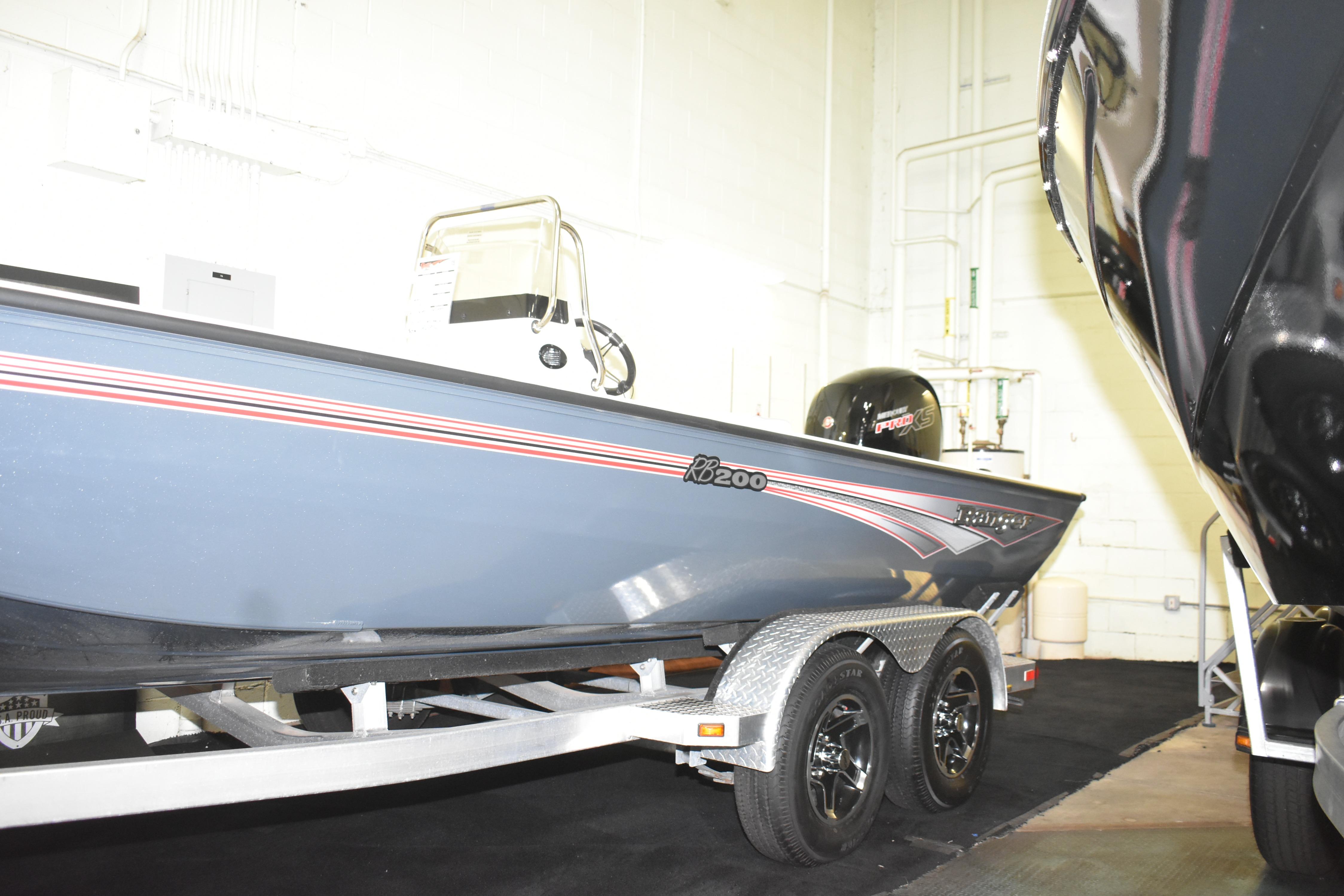 2024 Ranger RB200 boat on trailer in indoor showroom.