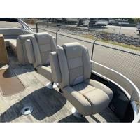 2025 Ranger Reata 223FC boat seats, beige upholstery, outdoor setting.