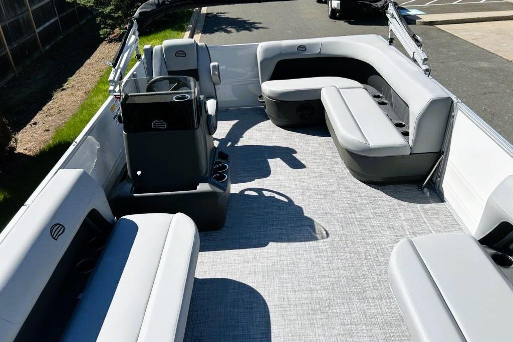 2026 Sun Tracker Party Barge 16 DLX interior with spacious seating and modern design.