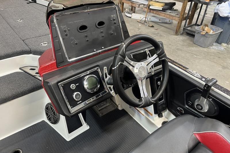 2022 Ranger Z520R boat cockpit with steering wheel and control panel.