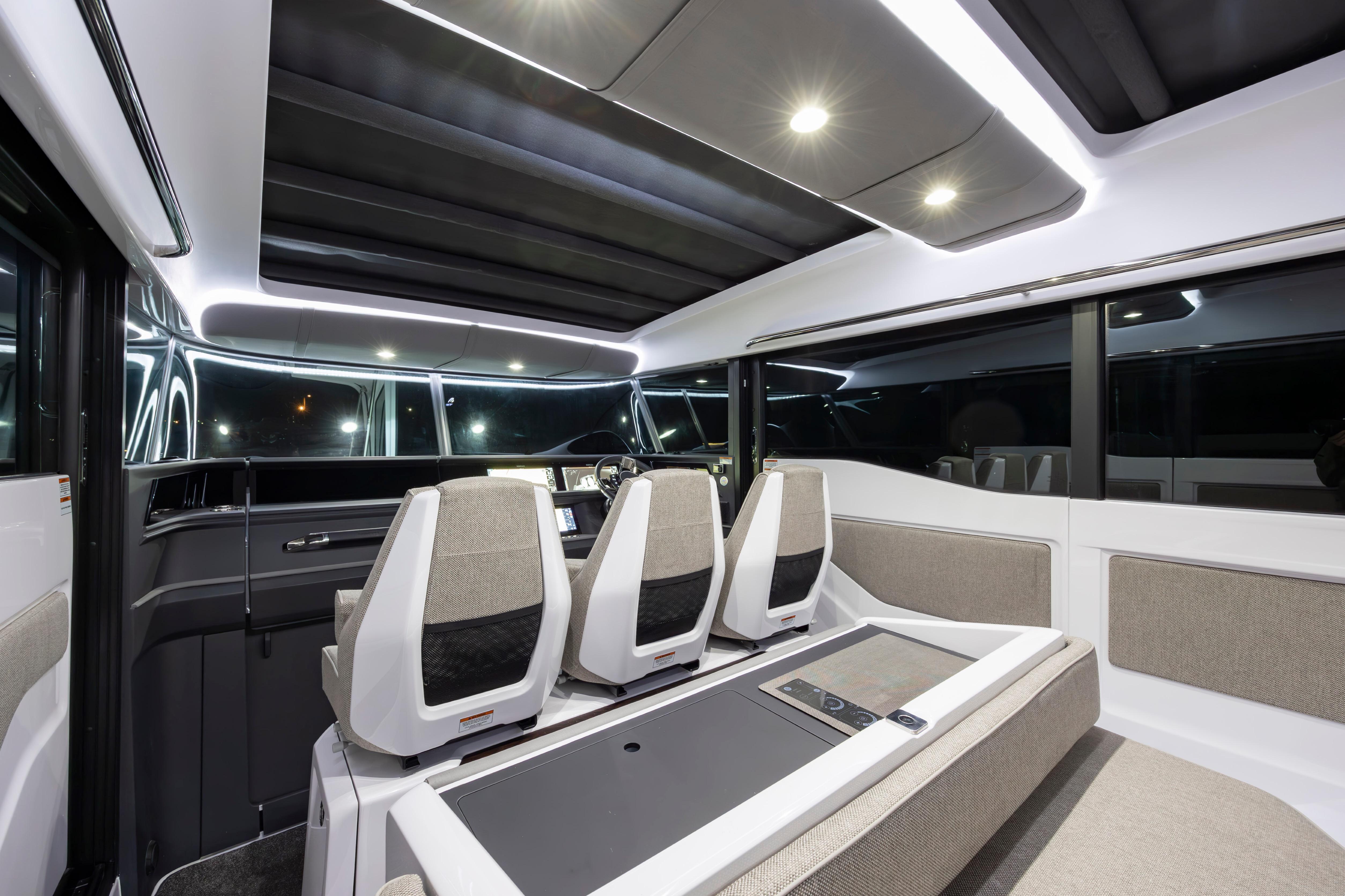 Interior of 2027 Axopar 45 XC Cross Cabin, featuring modern seating and sleek design.