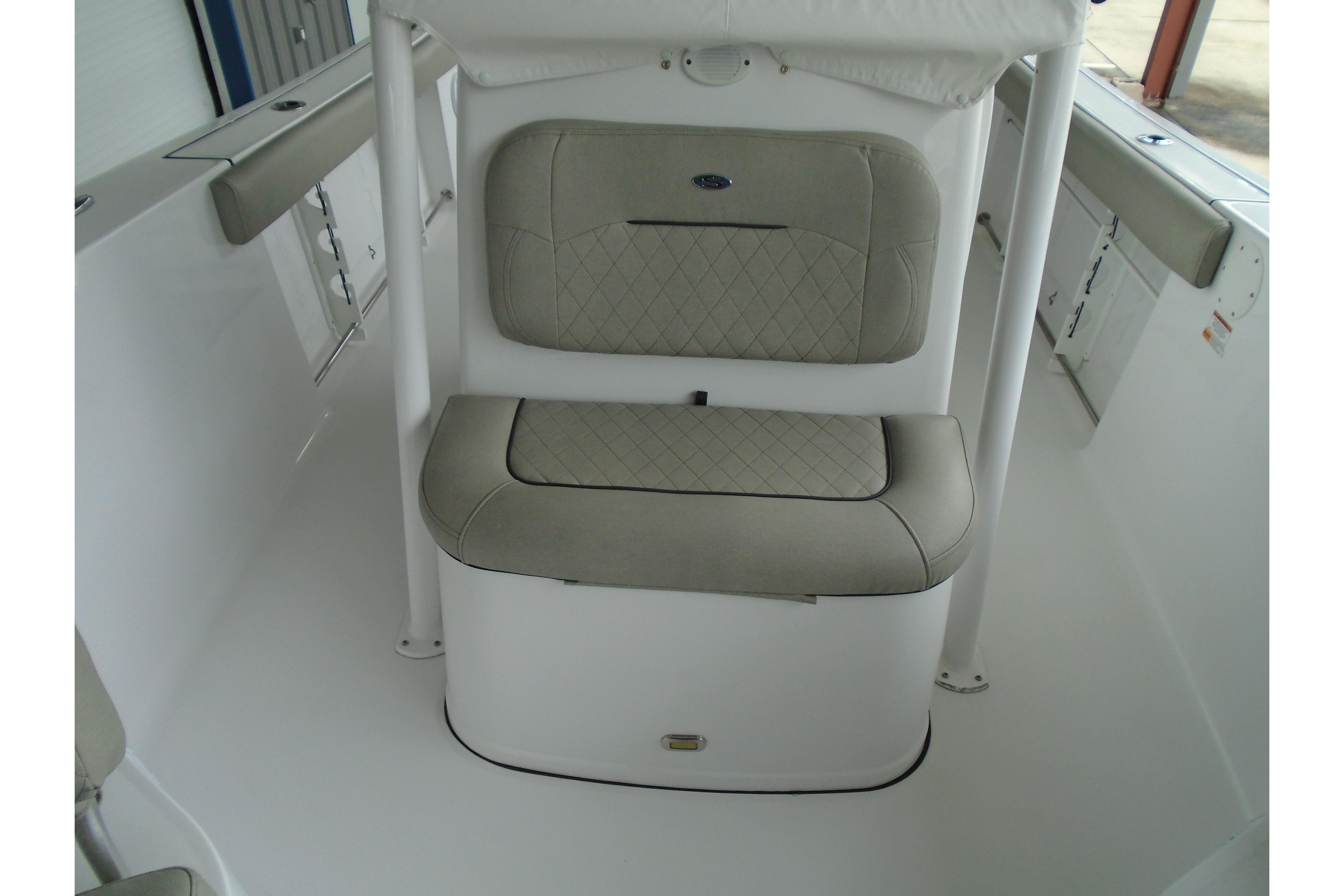 2022 Sportsman Heritage 241 Center Console boat interior with cushioned seating.