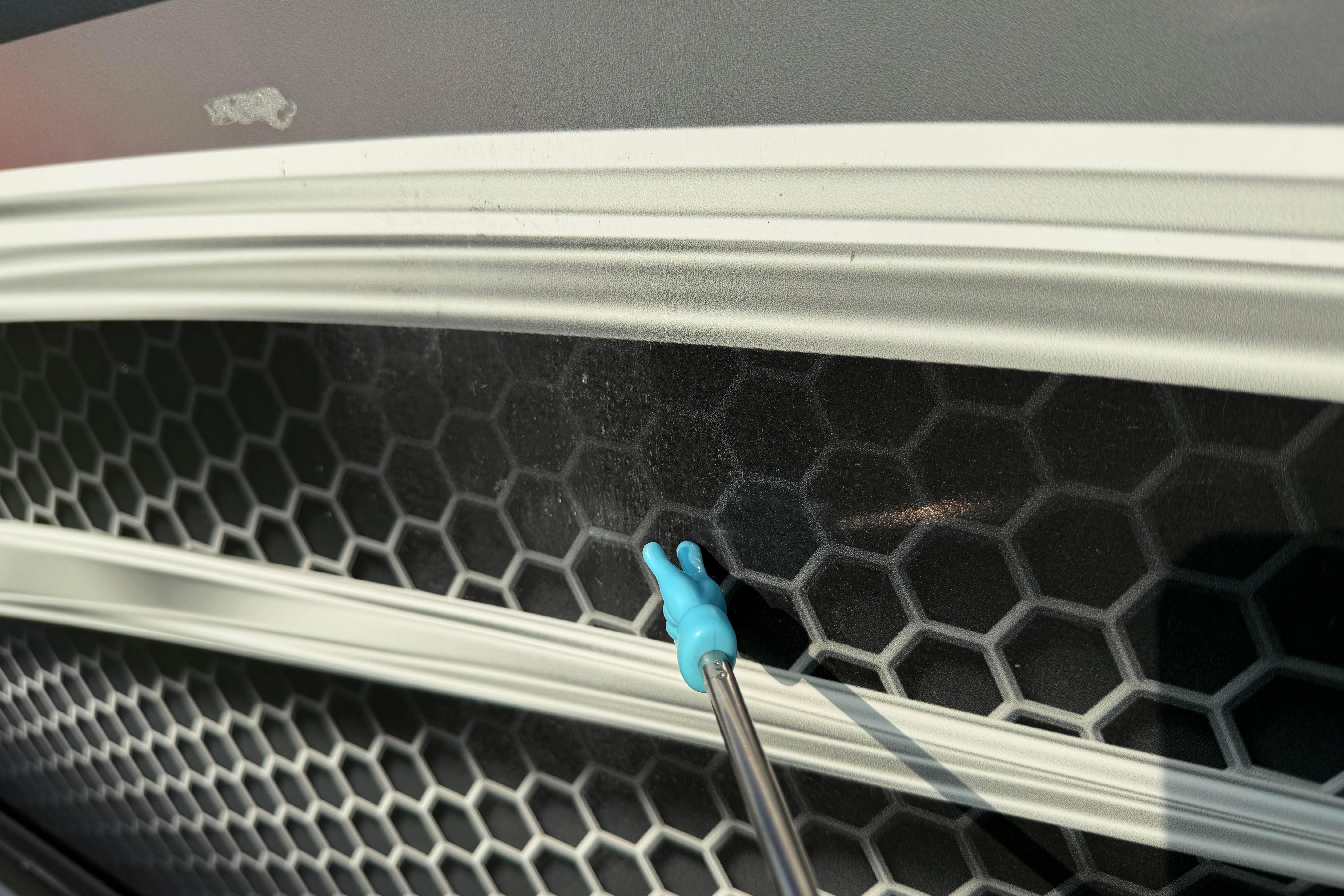 Close-up of Alumacraft Trophy 205 boat's hexagonal-patterned surface, 2019 model.