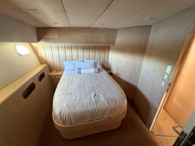Bedroom in a 1990 Custom MOTOR YACHT.