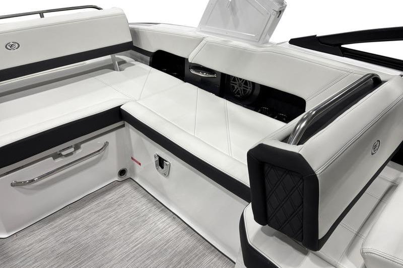 Luxurious interior seating of 2025 Cobalt R6 boat with sleek white upholstery.