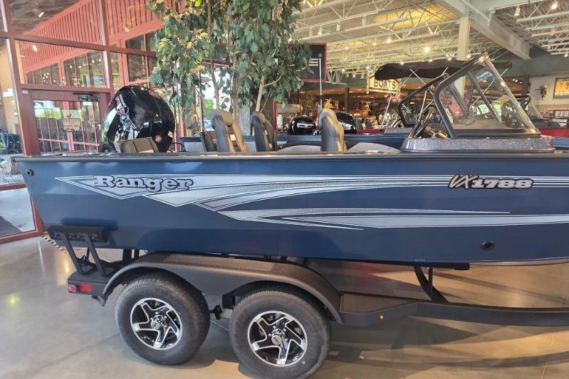 2026 Ranger VX1788 WT boat on display in showroom with trailer.