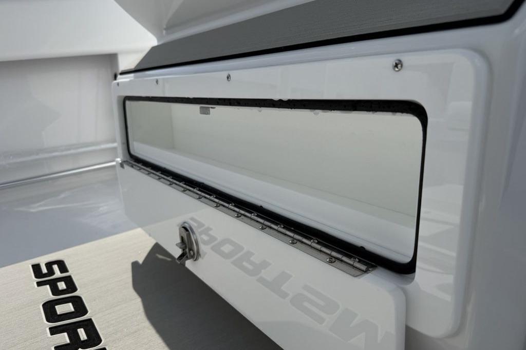 2026 Sportsman Open 252 Center Console boat storage compartment detail.