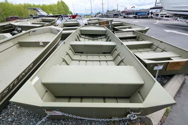 2023 Crestliner 1648M CR Jon boats displayed at a dealership.