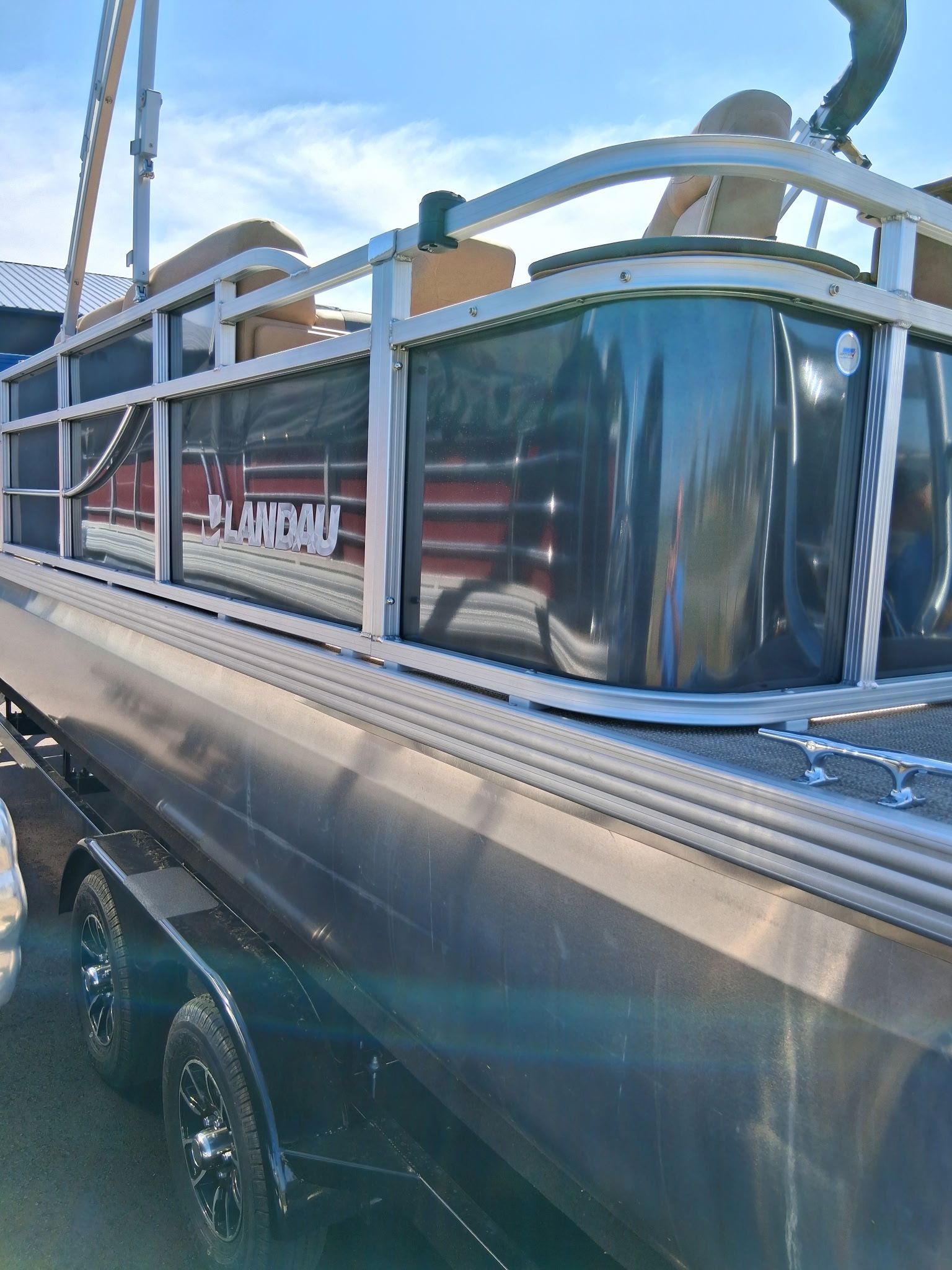 Landau Alure 23CC Fish-Charcoal boat, 2026 model, on trailer.