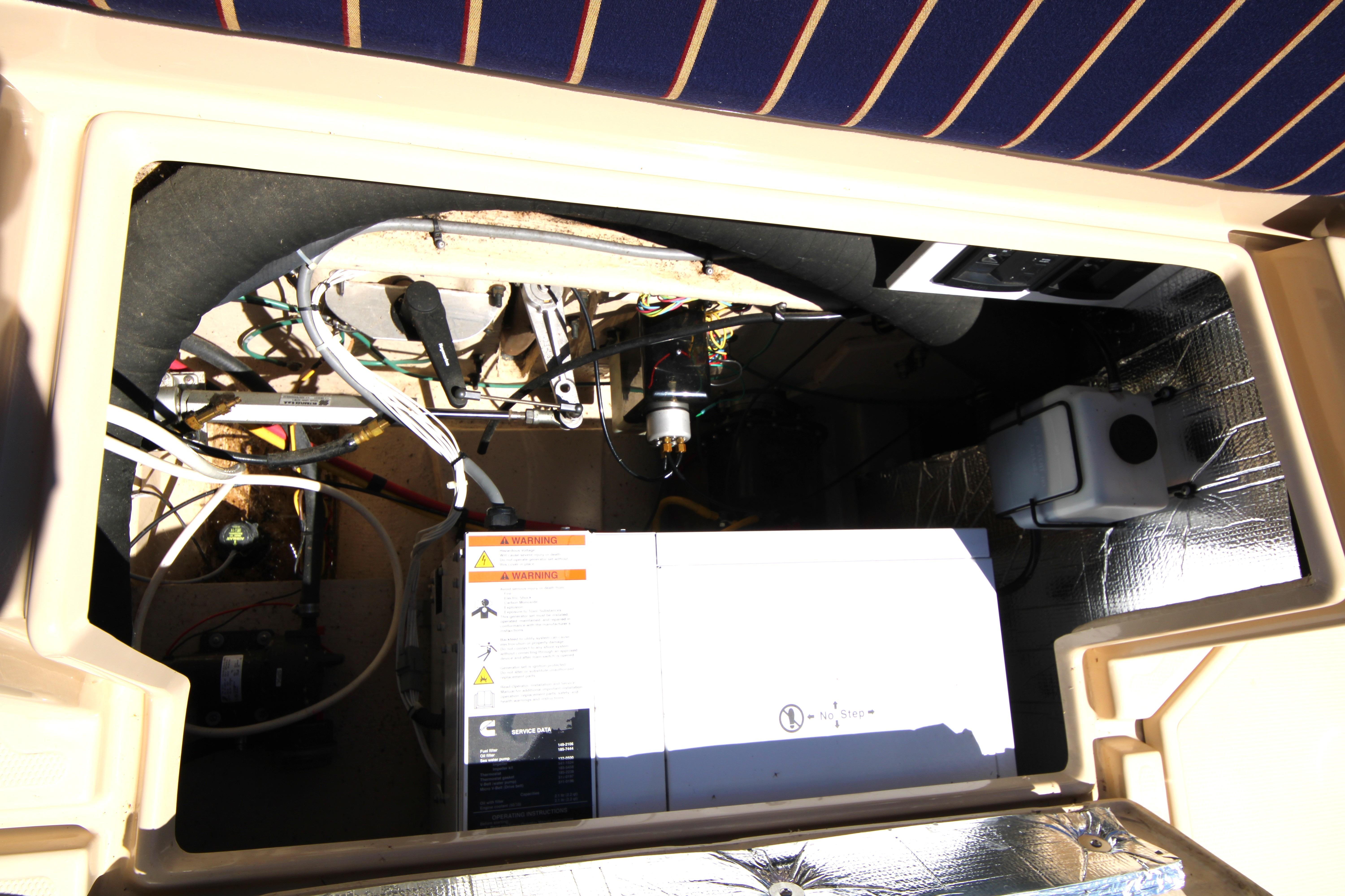 Engine compartment of 2013 Ranger Tugs R-31 CB with visible wiring and components.