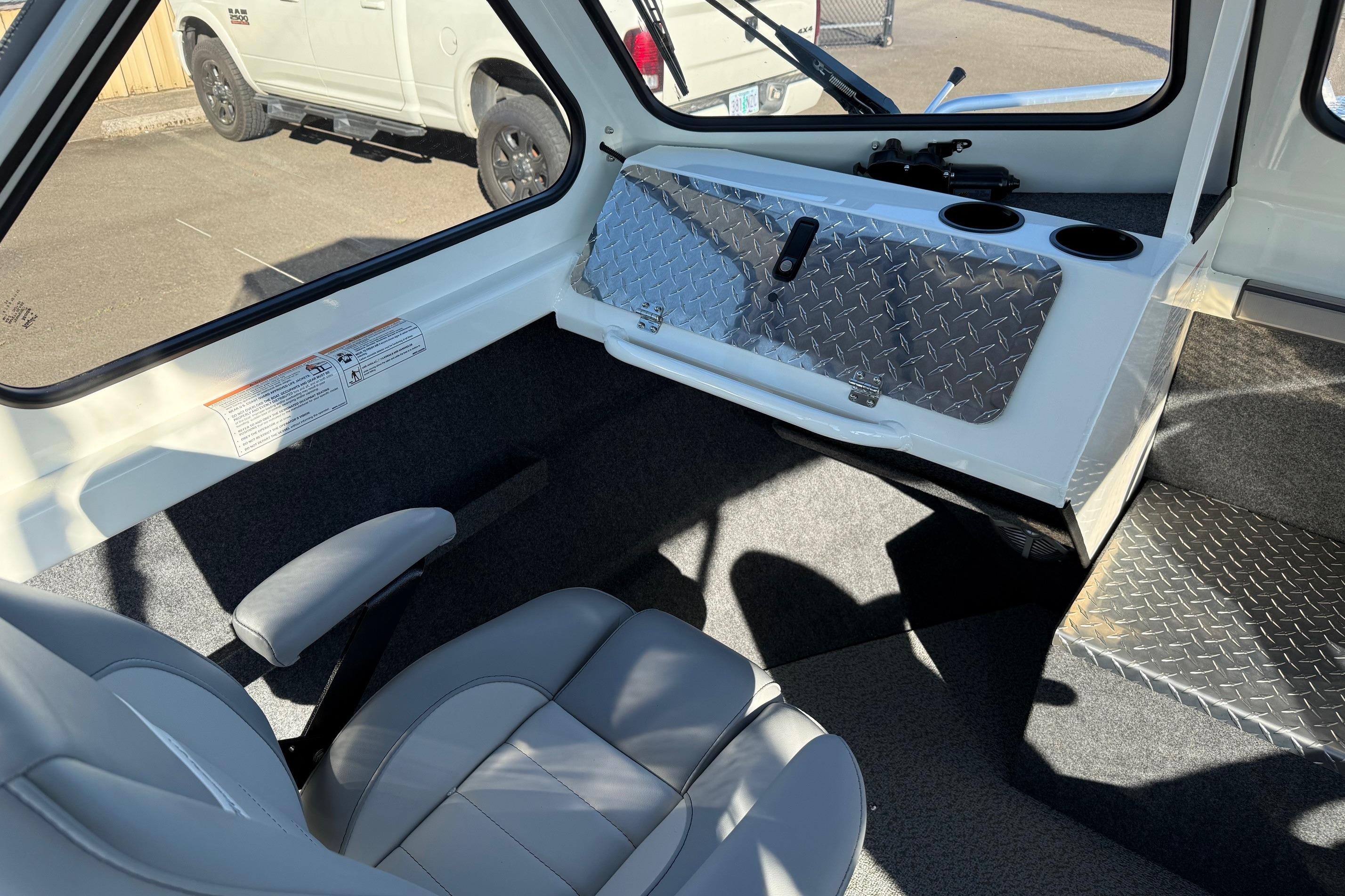 Interior of 2026 Thunder Jet 185 Luxor boat with seating and storage.
