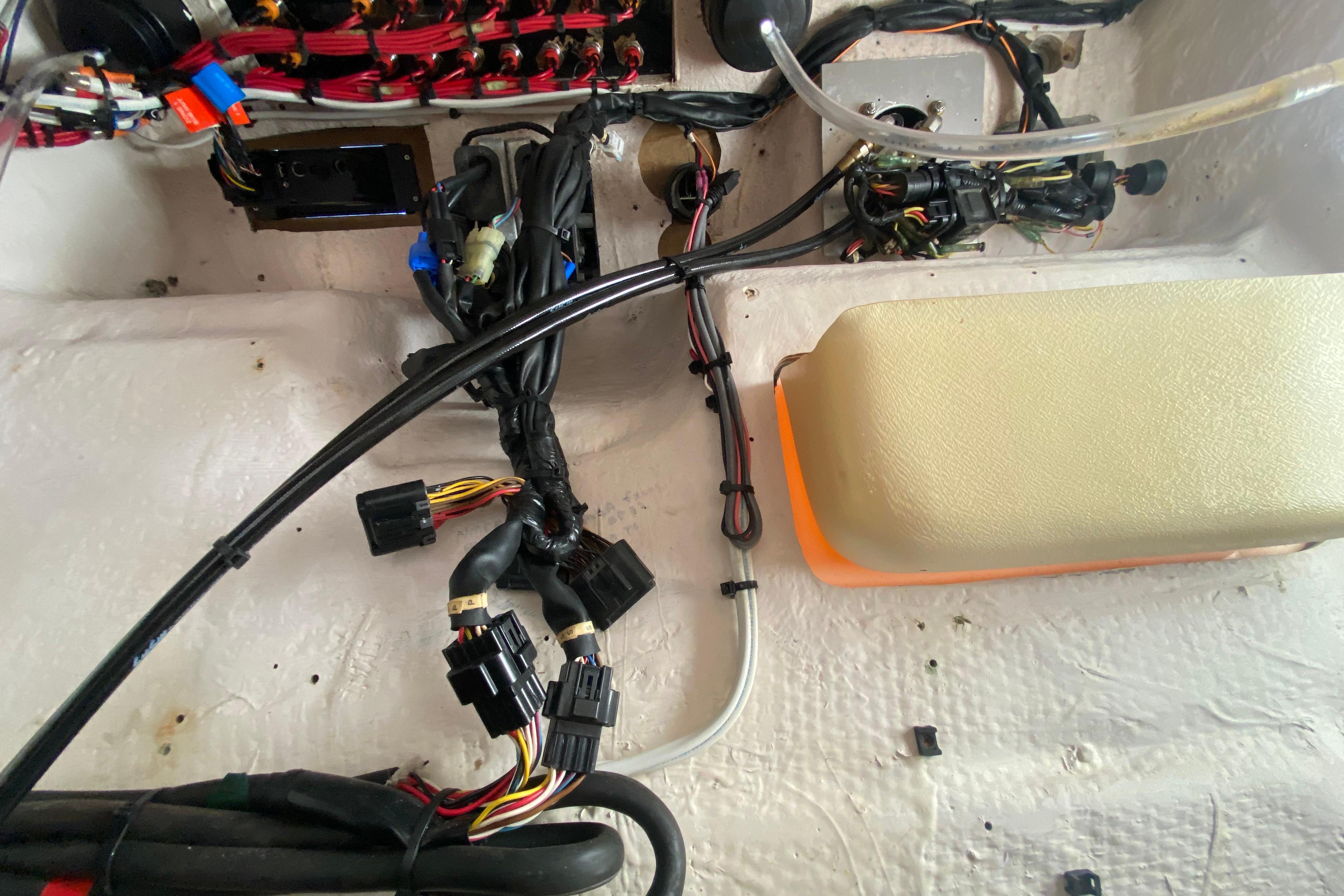 Electrical wiring and components inside a 2004 Grady-White Canyon 283 boat.