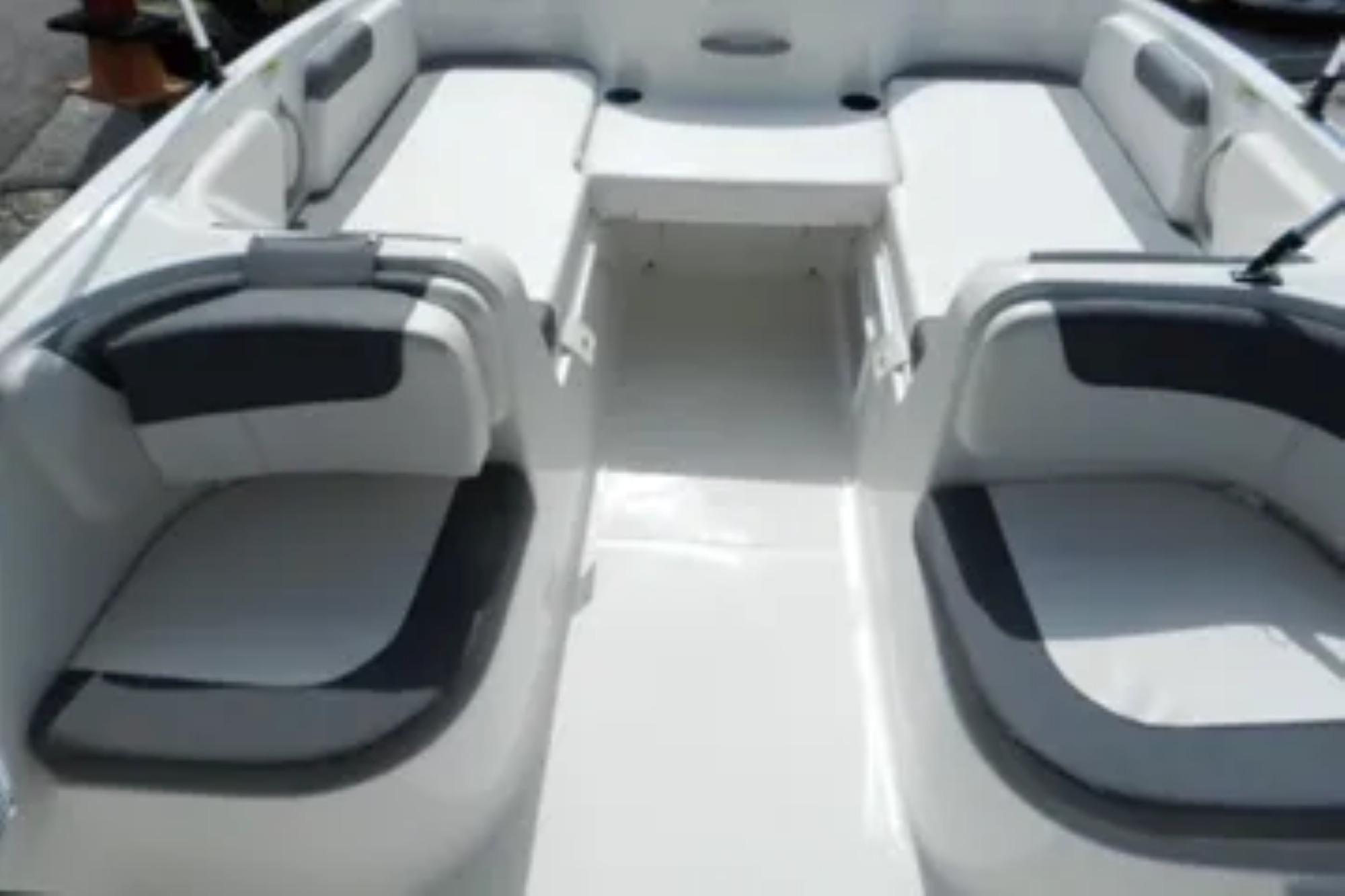 2026 Bayliner Element E18 boat interior with spacious seating and modern design.