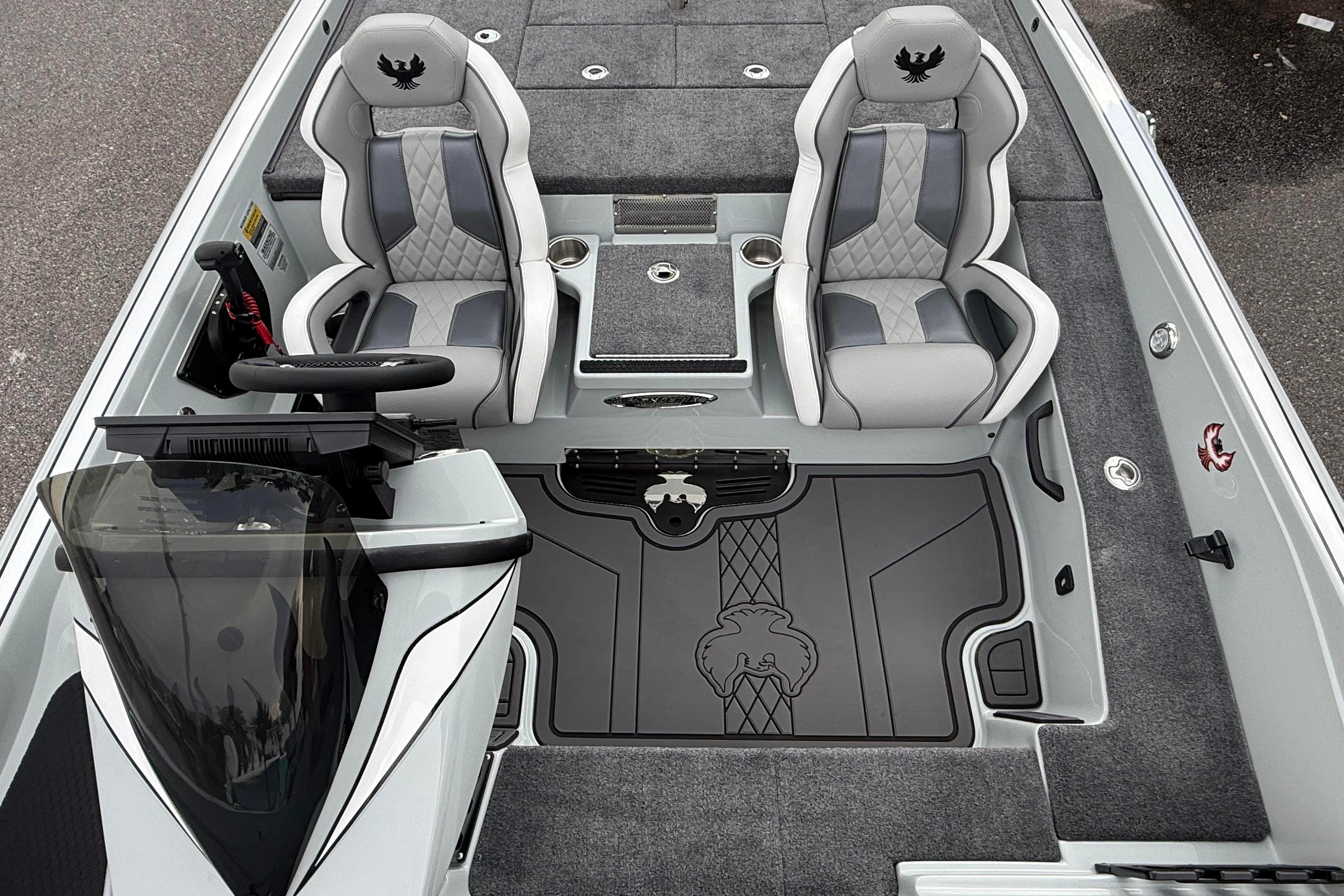 2027 Phoenix 921 Elite X II boat interior with dual seats and sleek design.