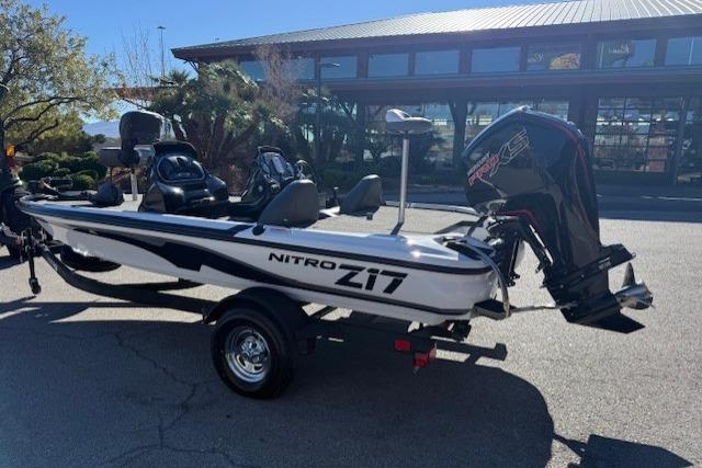 2026 Nitro Z17 boat with powerful outboard motor, parked outdoors.