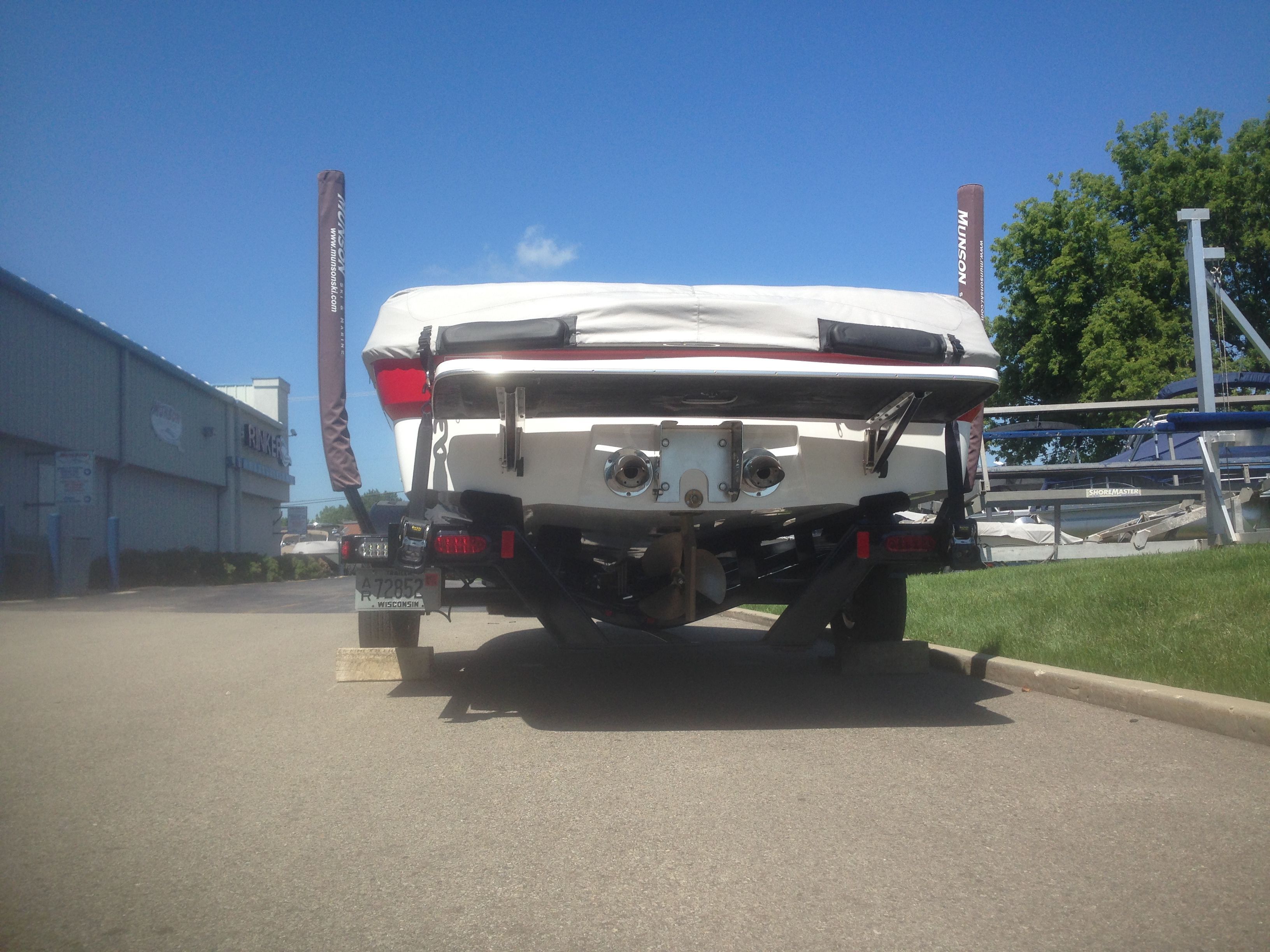 2014 Malibu Response TXi boat parked on a trailer.