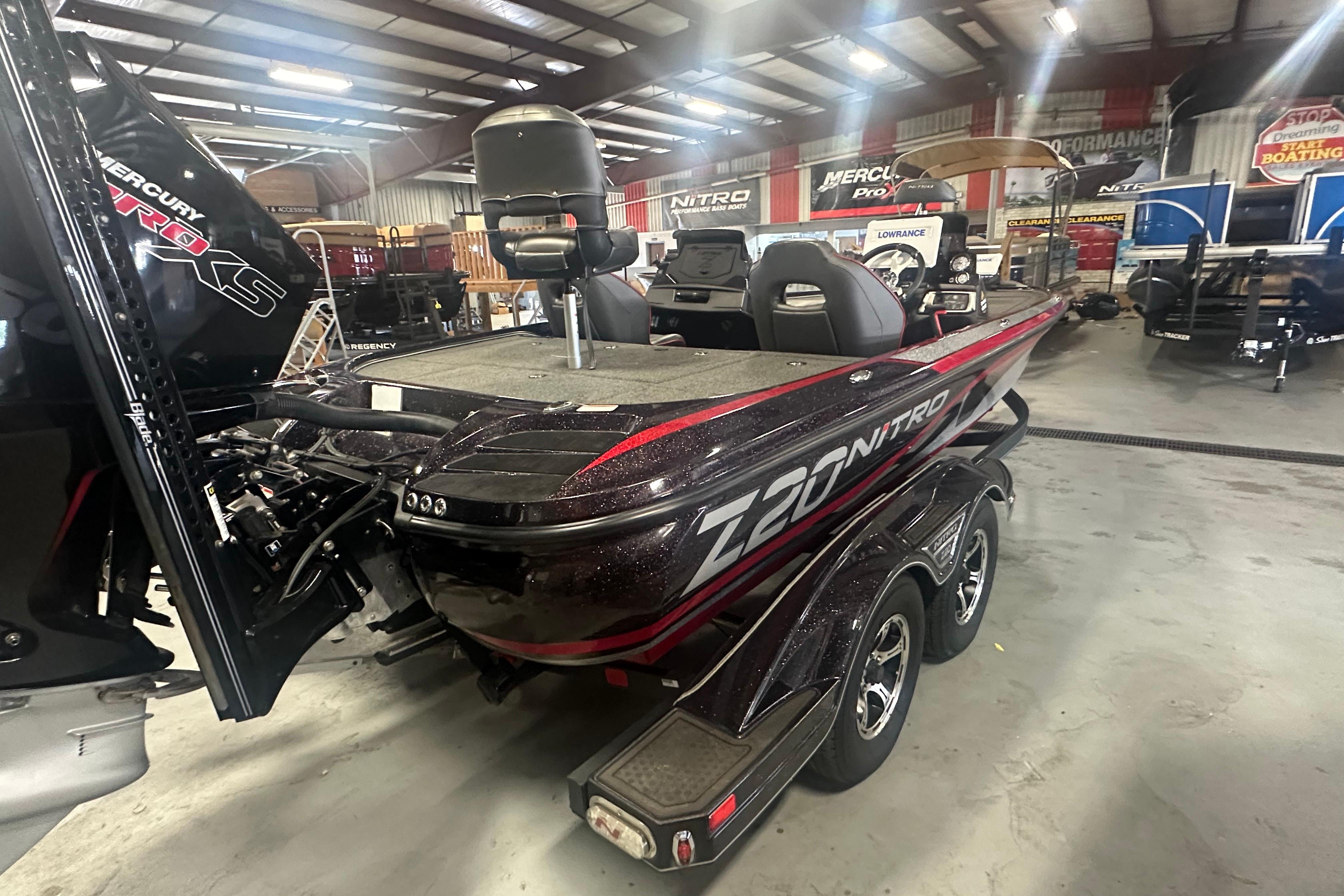 2022 Nitro Z20 Pro boat in showroom, featuring sleek design and powerful Mercury engine.