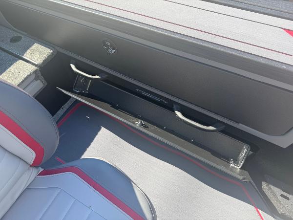 2025 Alumacraft Trophy 185X SC Rotax S interior with open storage compartment and seating.