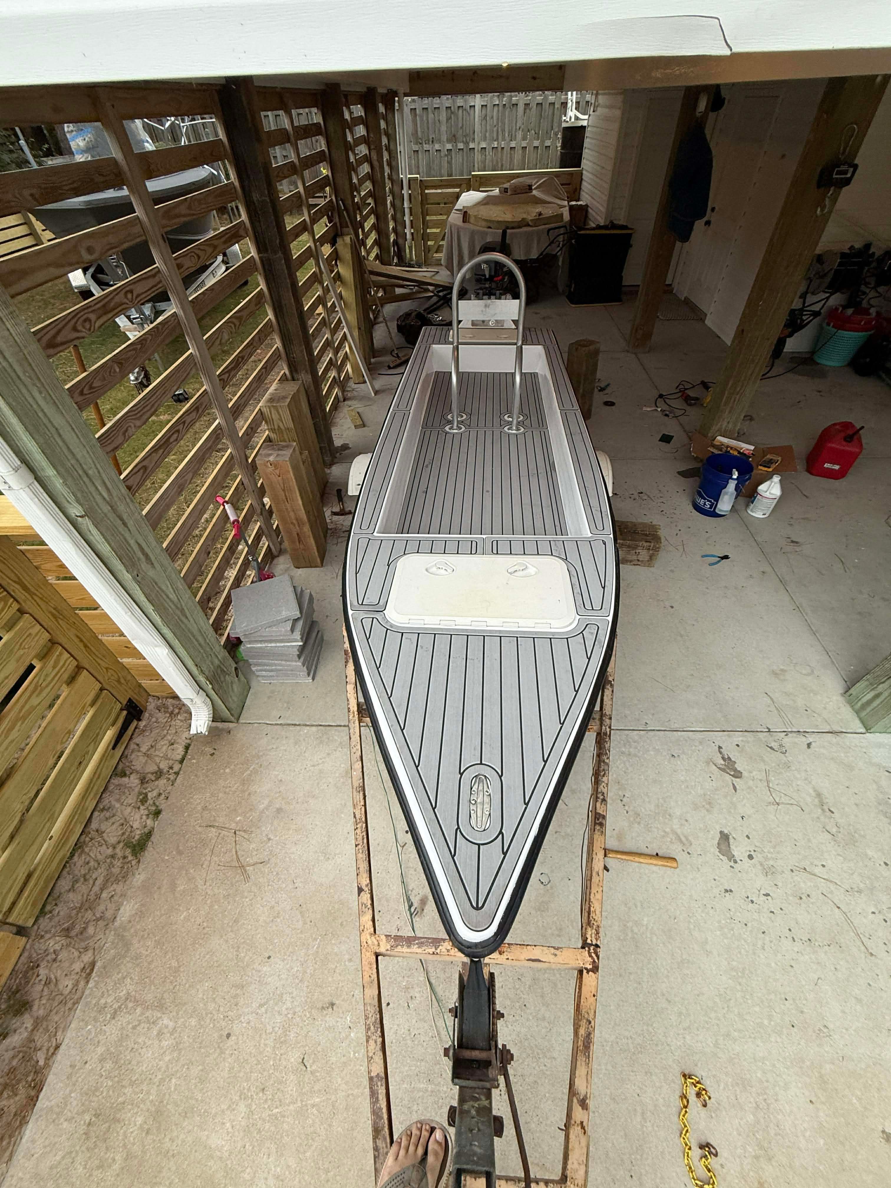 Home-built Skiff Craft boat from 2023 in a workshop.