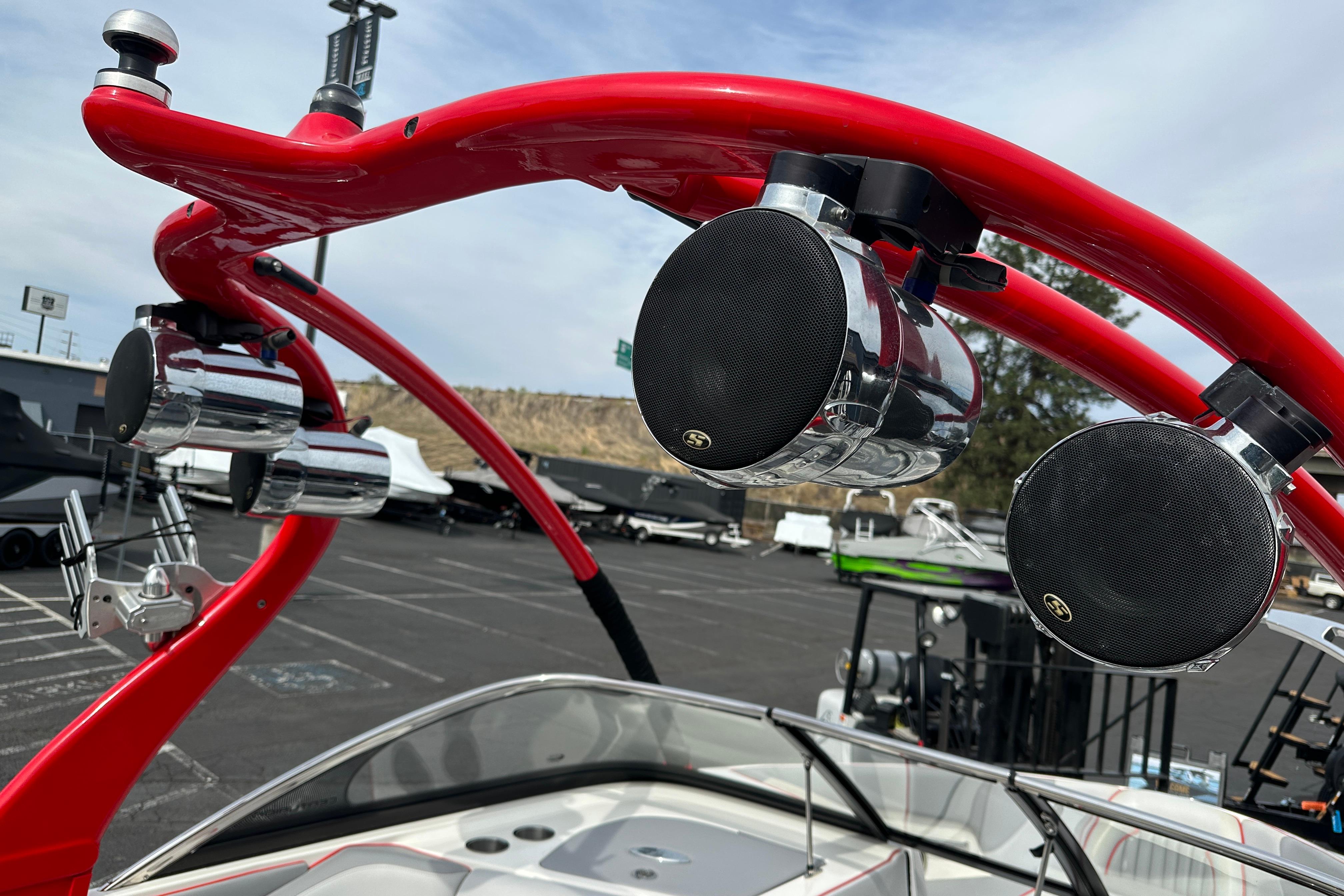 Red wakeboard tower with speakers on a 2008 Centurion Enzo SV240 boat.