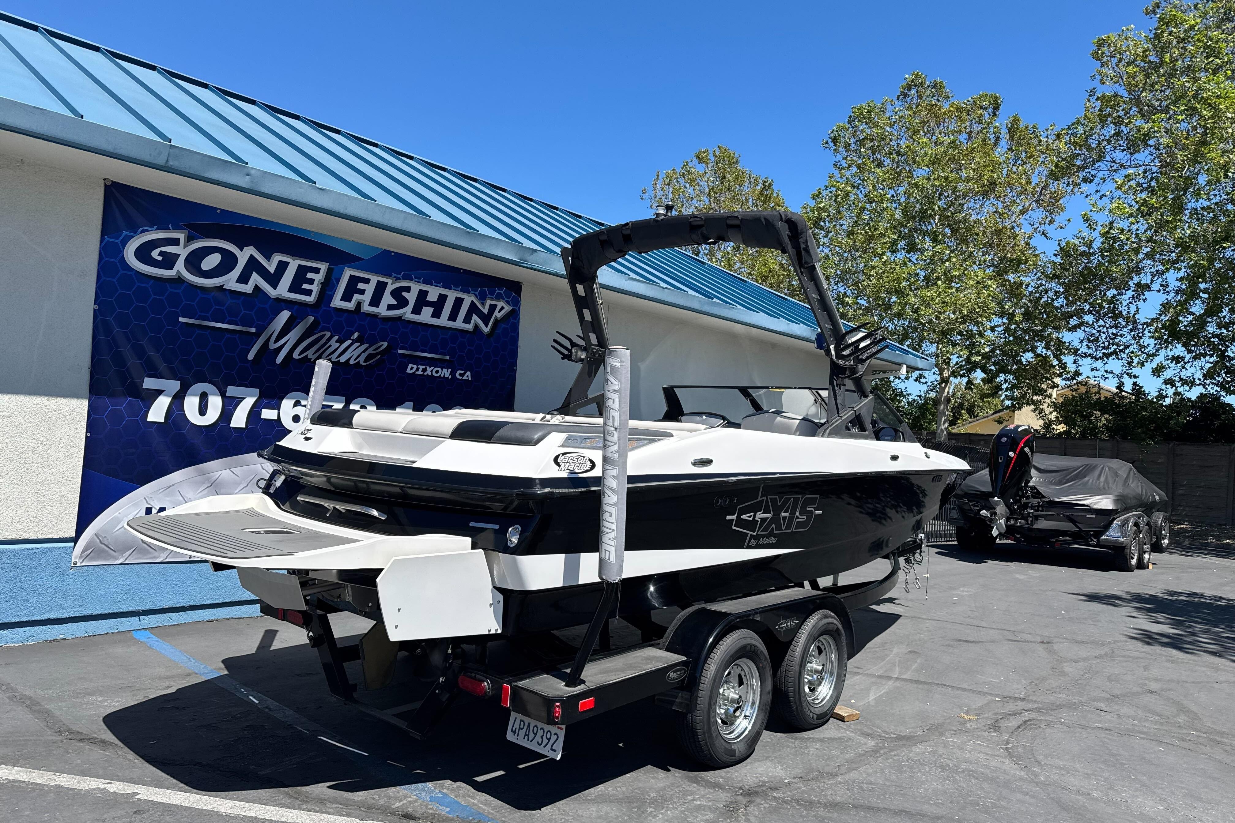 2015 Axis A20 boat on trailer at Gone Fishin' Marine dealership.